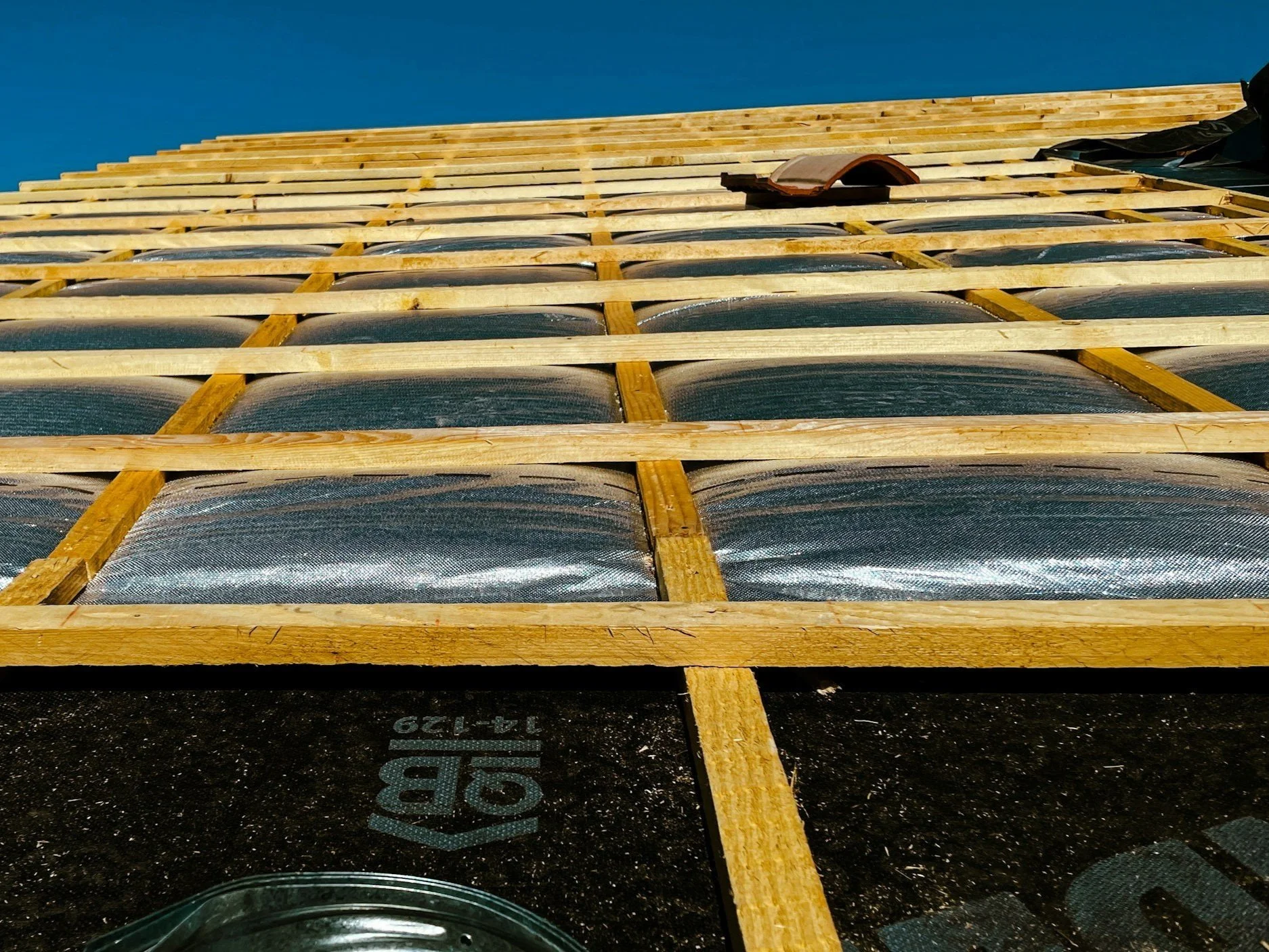 Slate roofing offers a stylish look, lasting over 100 years, with fire resistance and low maintenance. However, its heaviness necessitates extra framing and comes at a higher cost than other materials.