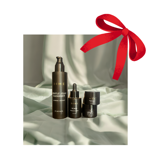 black bottles on white background and a red bow