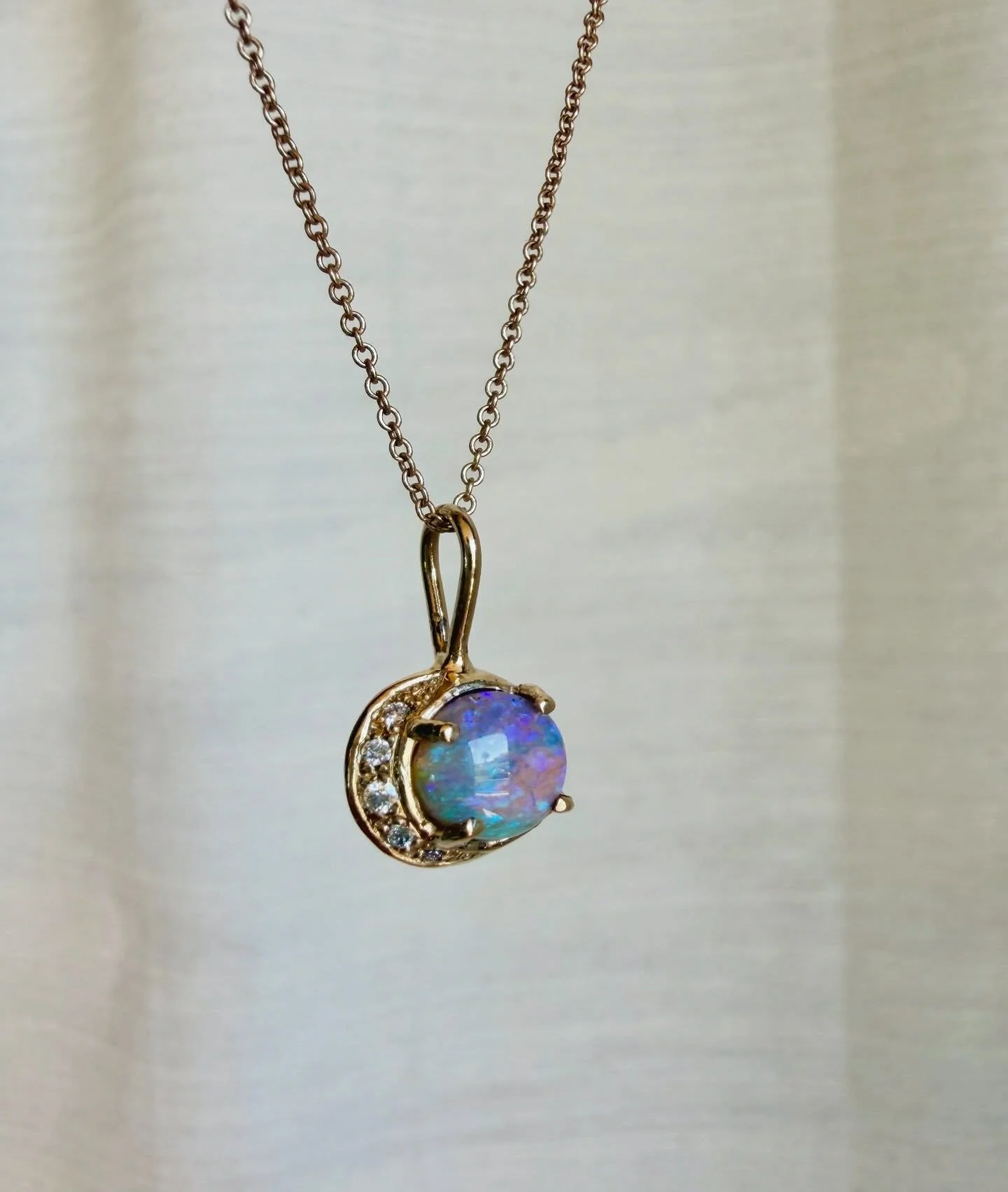 Next up from our brand new collection of Tidal Moons is the Mermaid 🧜🏼&zwj;♀️✨

This peachy Australian pipe opal is a mermaid&lsquo;s dream! Covered in flashes of teal, blue, and purple fire with the most interesting sandstone within mimicking crys