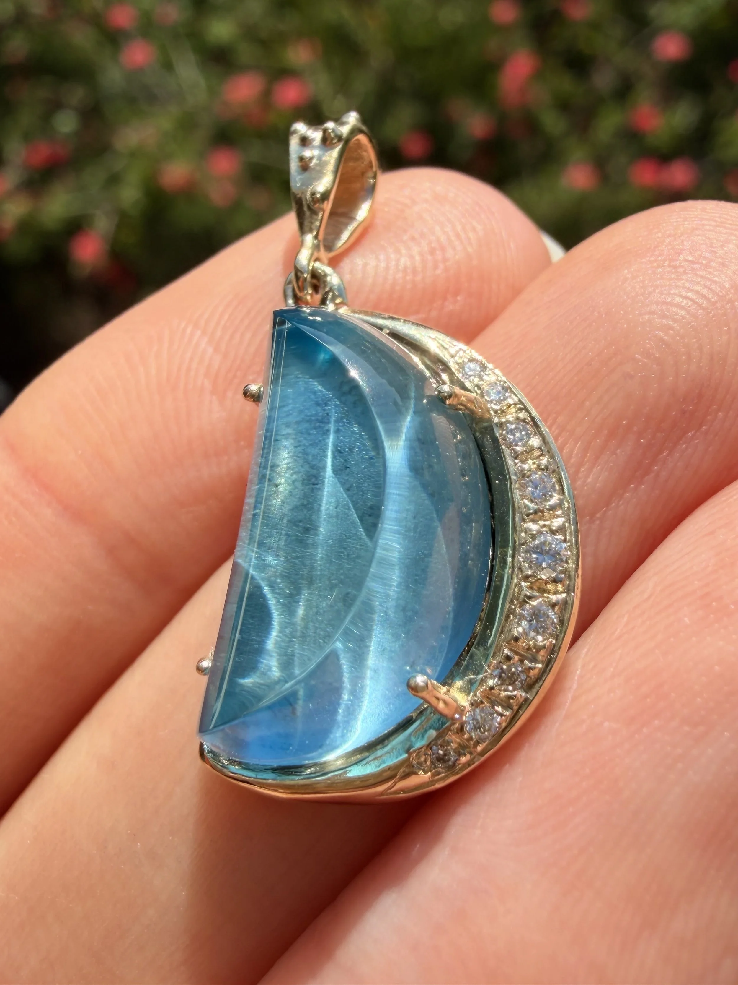 Caribbean blue topaz tidal moon.jpeg