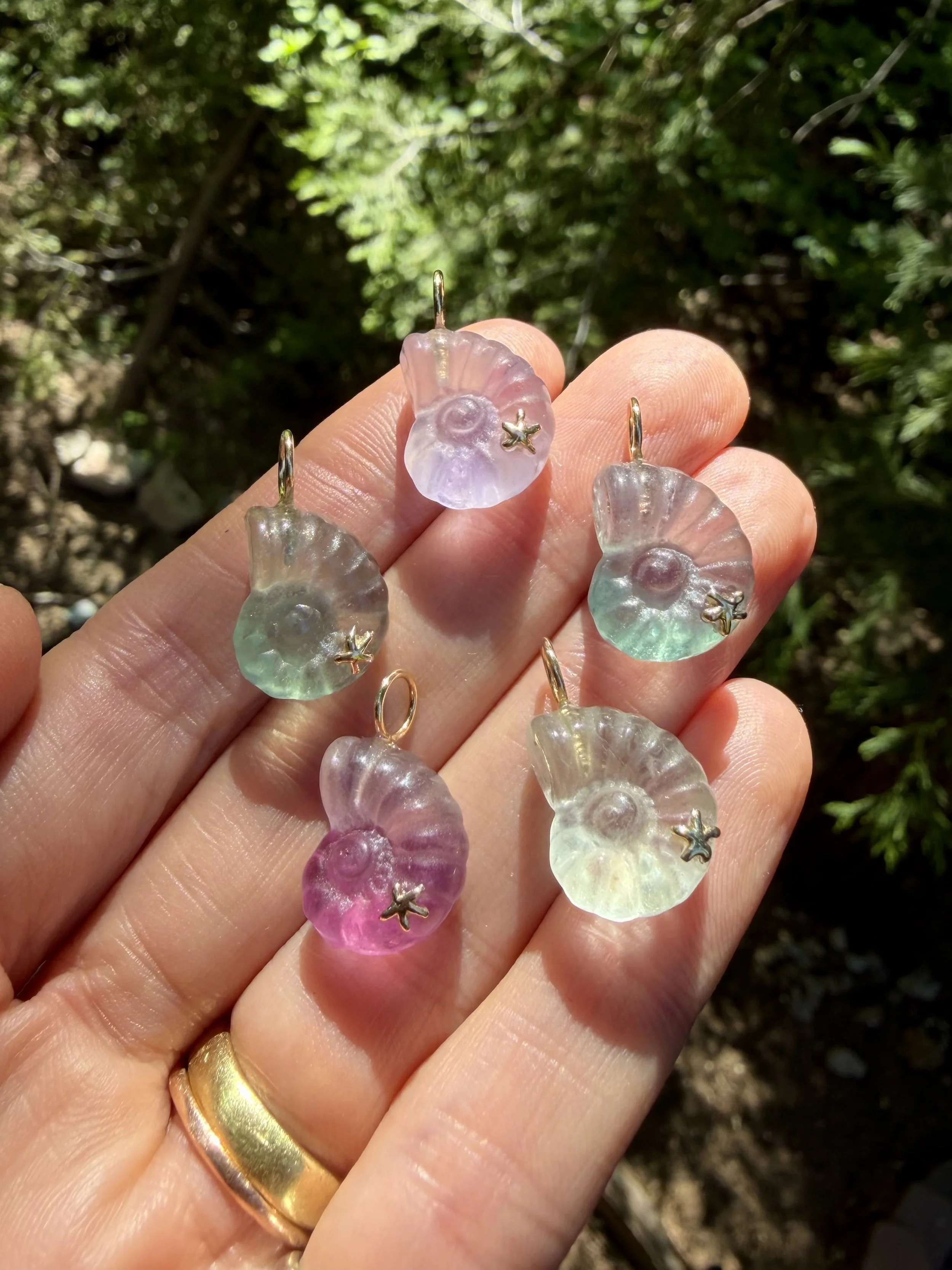 Fluorite nautilus charms finished.jpeg