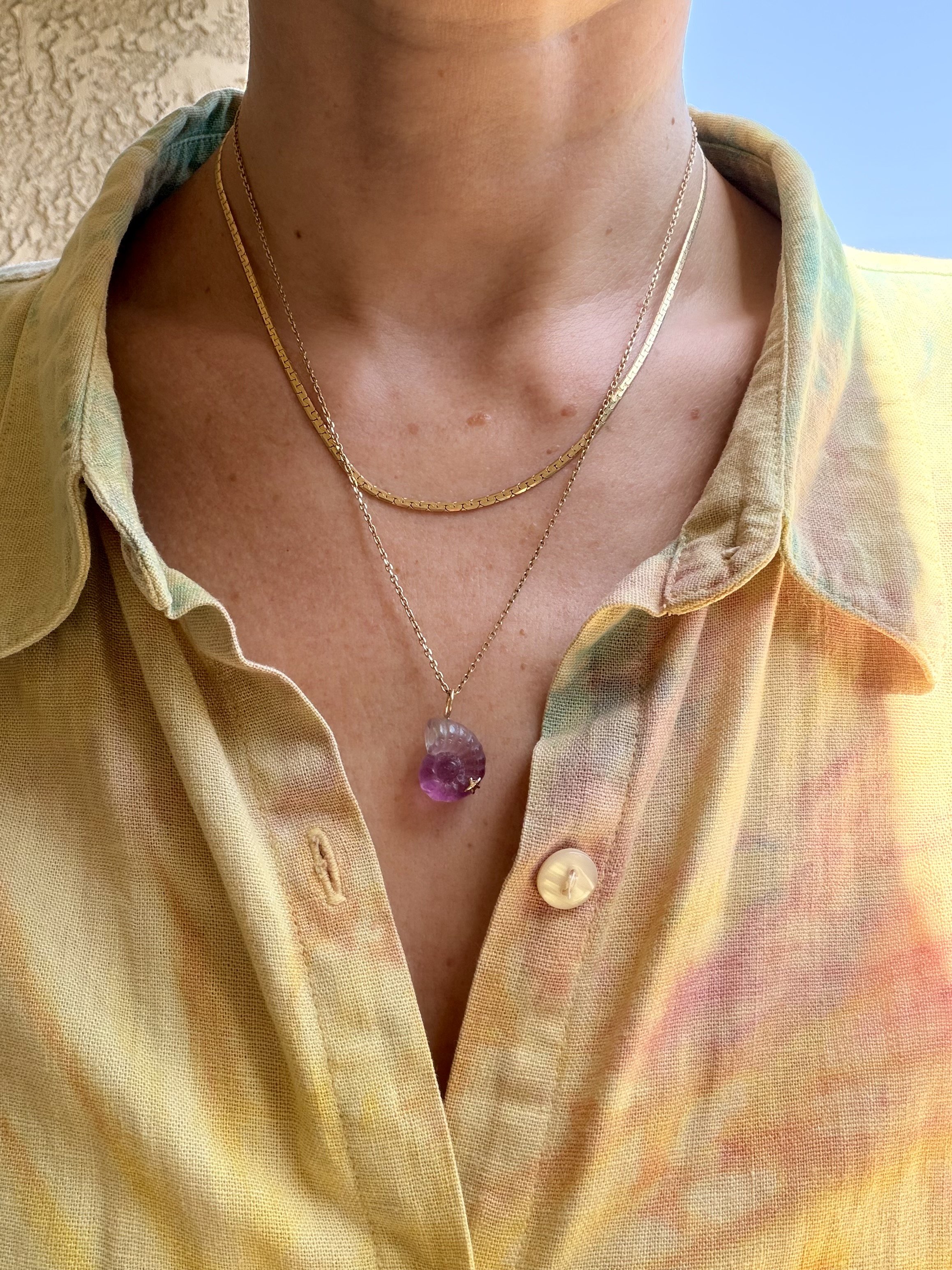Pink fluorite nautilus model.jpeg