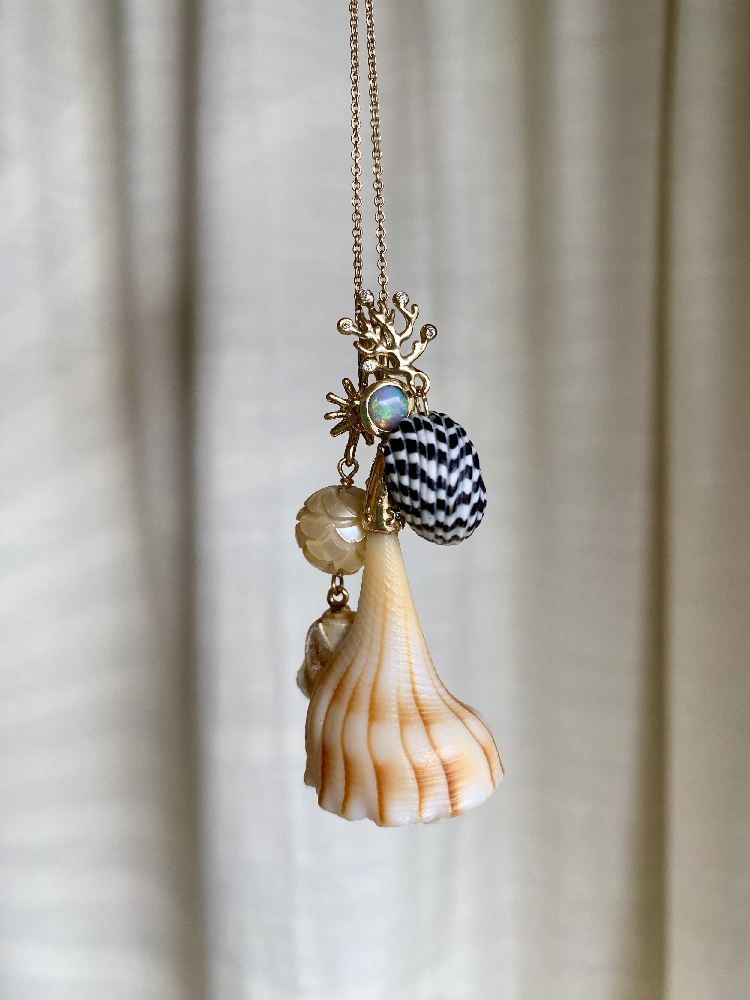 14k gold seashell pendants.jpeg