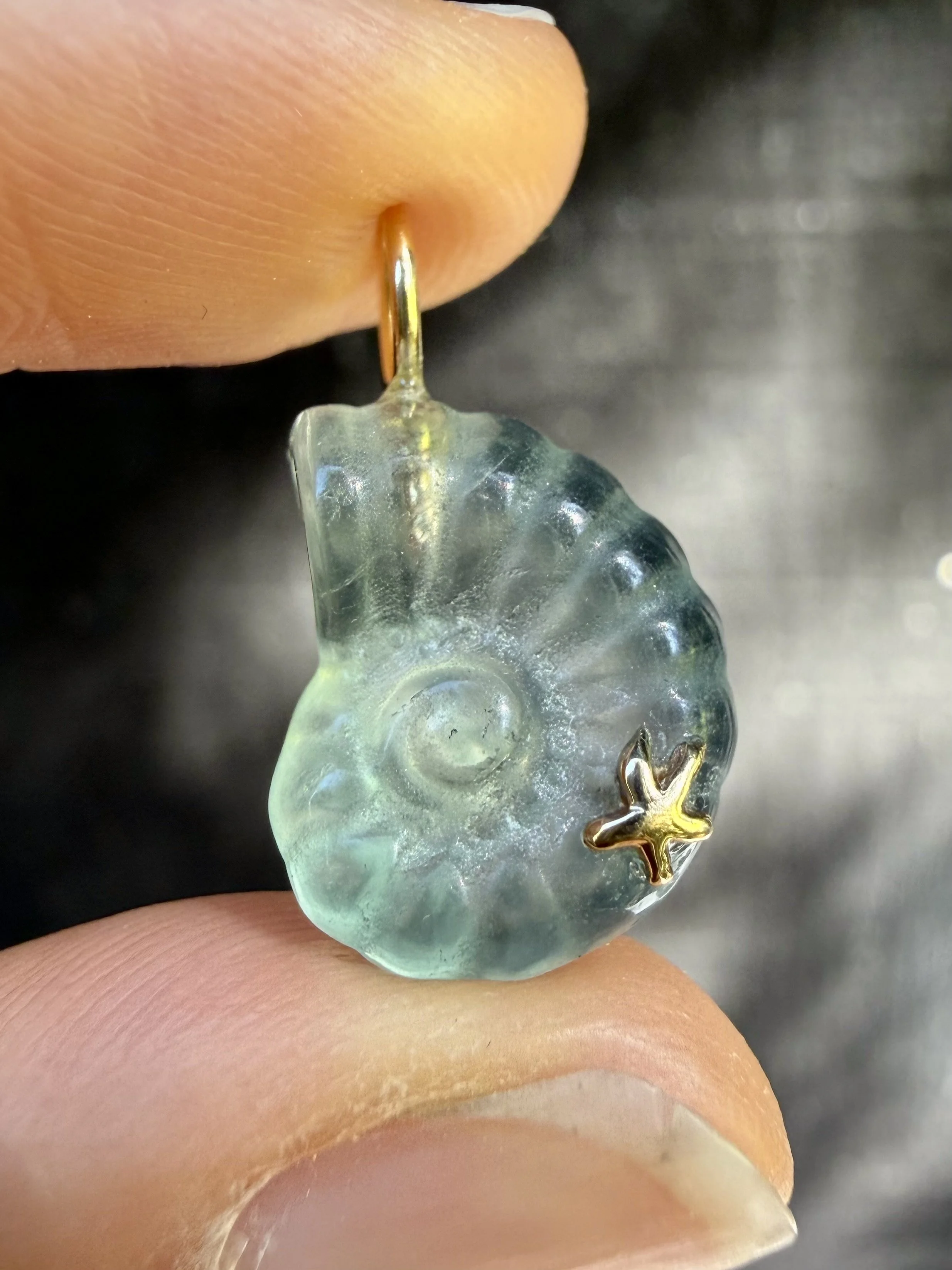 Green fluorite nautilus charm close up.jpeg