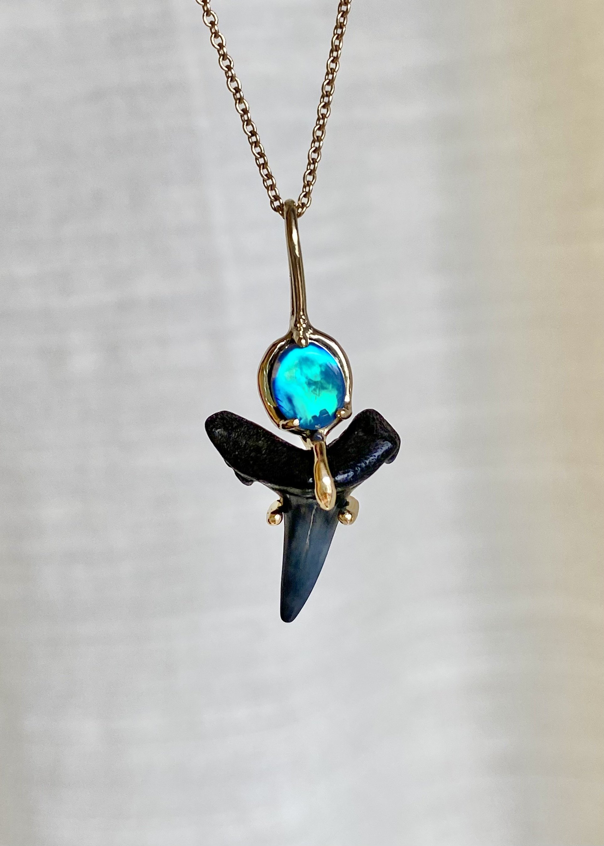 opal shark tooth pendant.jpeg