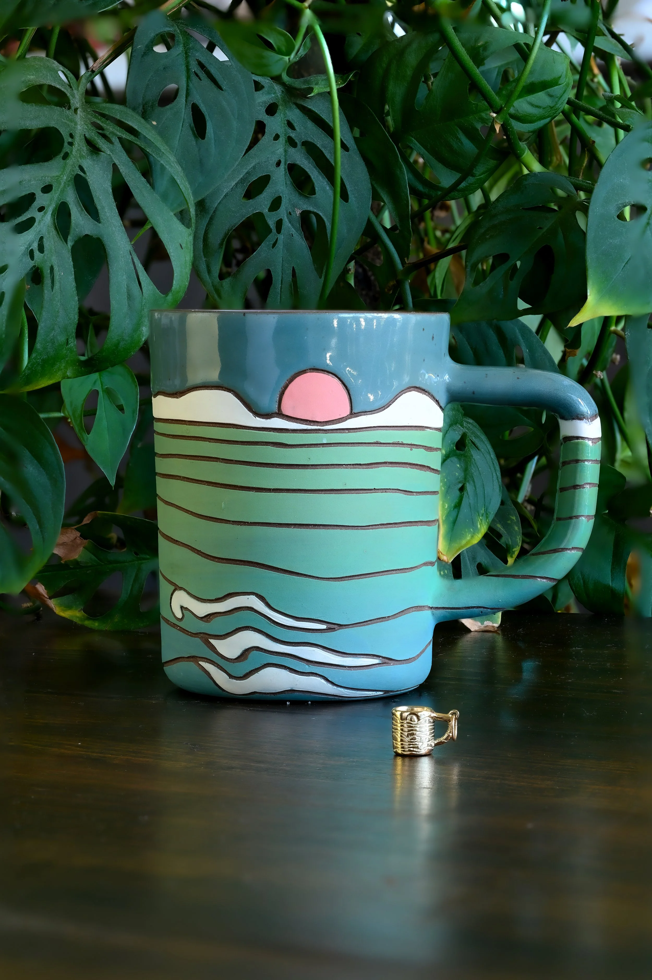 Cal charm and mug stacked-2.jpg