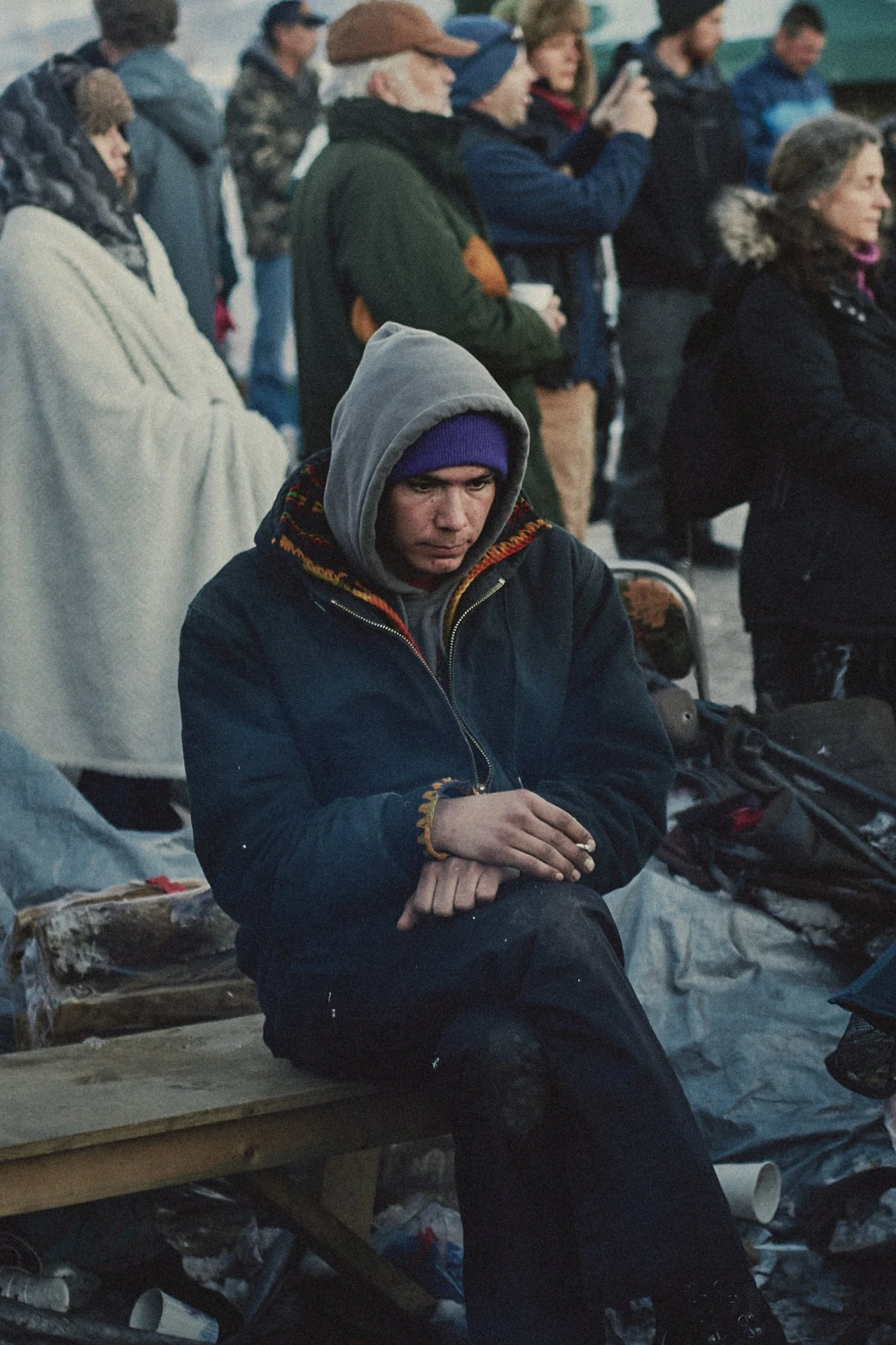 standing-rock-campfire-man-cigarette--1920px.jpg