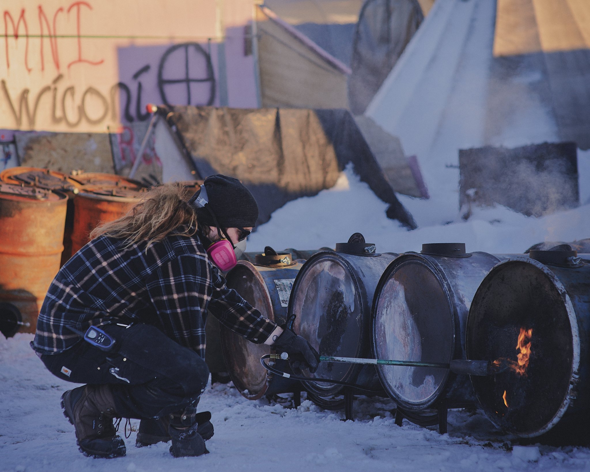 standing-rock-fire-barrels-guy-2048px.jpg
