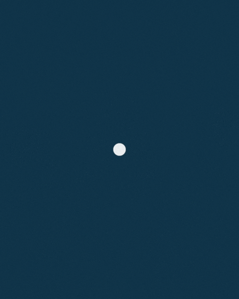 A white ball against a dark blue background.