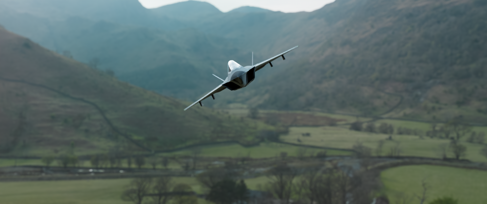 Fighter jet aircraft flying low over a green, hilly landscape with mountains in the background.
