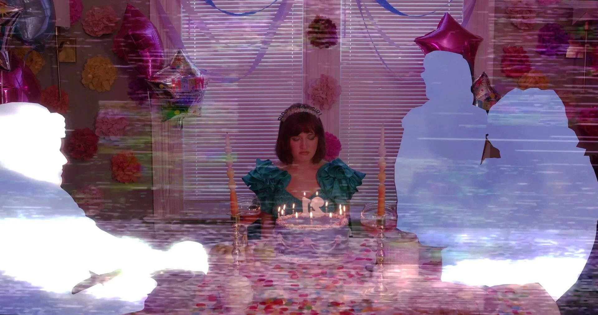 girl looking at her birthday cake, family disappearing