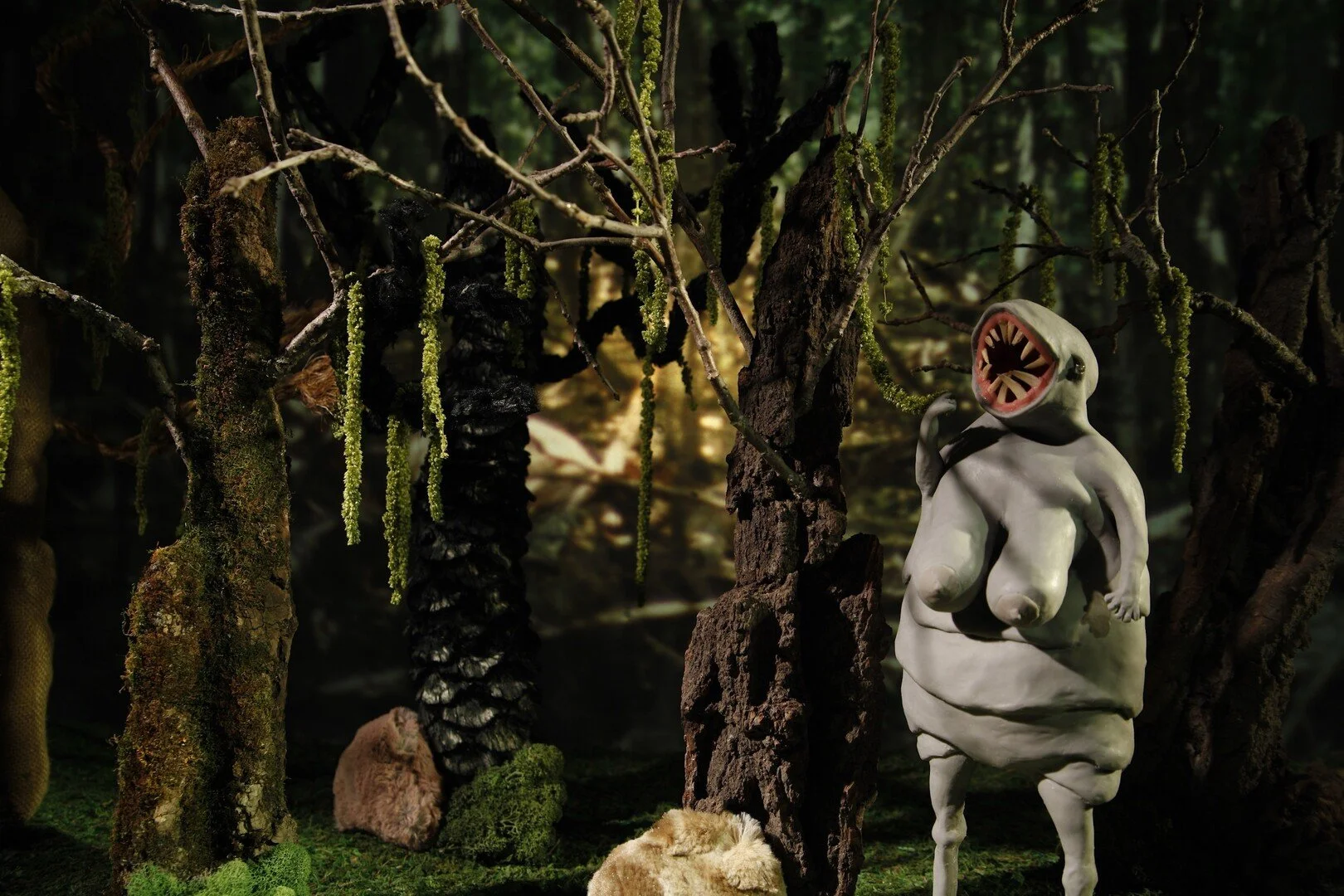 claymation monster in the woods