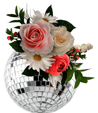 A floral arrangement with pink and white roses, daisies, and greenery in a disco ball vase.