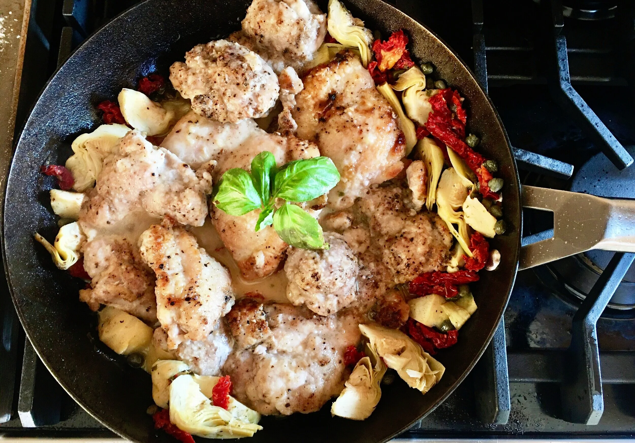 Mediterranean Chicken Thighs with Artichokes and SunDried Tomatoes