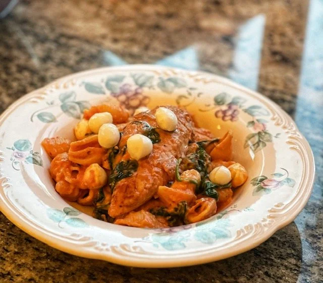Chicken and Shell Pasta with Tomato Cream Sauce and Spinach
