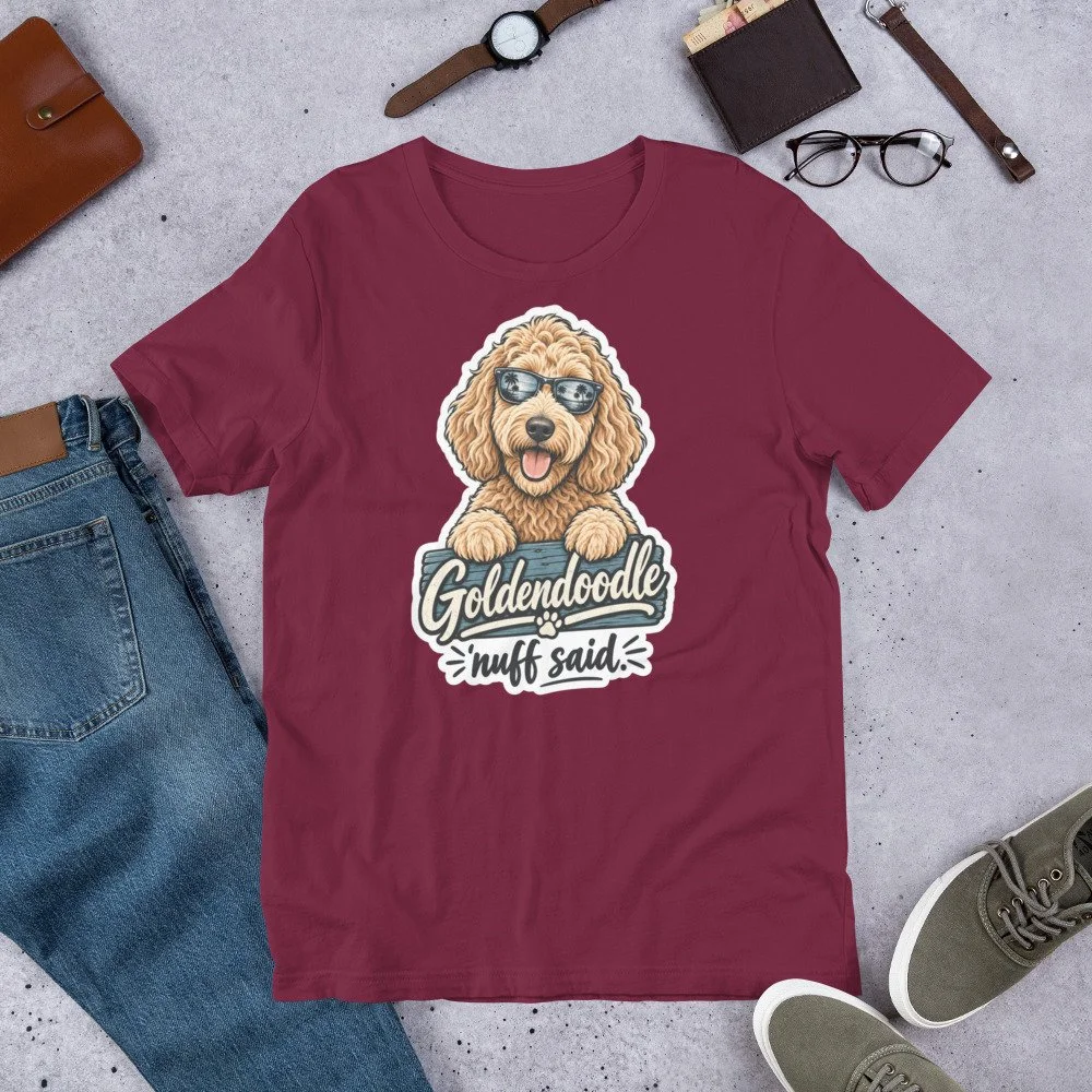 Goldendoodle ’Nuff Said T-shirt design featuring a happy curly-haired doodle wearing sunglasses with palm trees reflected in the lenses. unisex-staple-t-shirt-maroon-front
