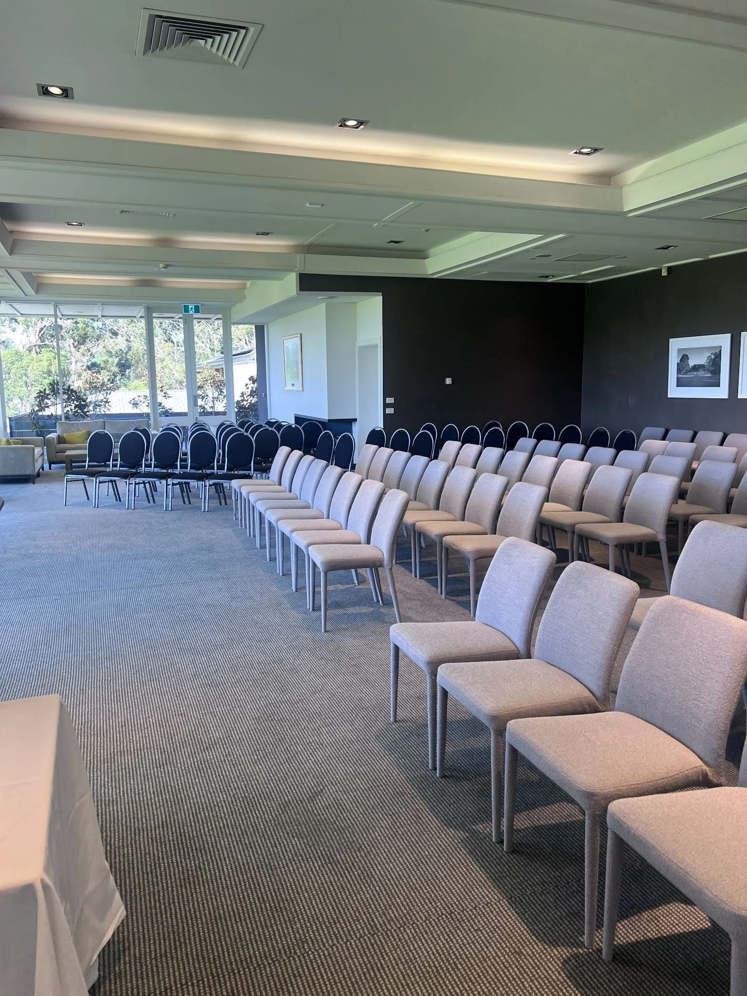 A peaceful consultation setting with documents and notes on a table, representing the importance of understanding funeral arrangements, service options, and costs before making decisions.
