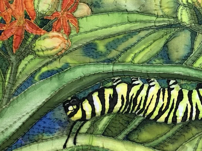 Marty Kotter, Hungry Monarch Caterpillar on Milkweed (detail)  17" x 19" Art quilt: silk, silk paint, cotton batting and backing NFS