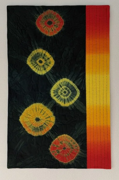 Felice Dahlhausen, Radiating Energy (38" x 24" Hand-dyed cotton fabric, wool batting, cotton thread $800