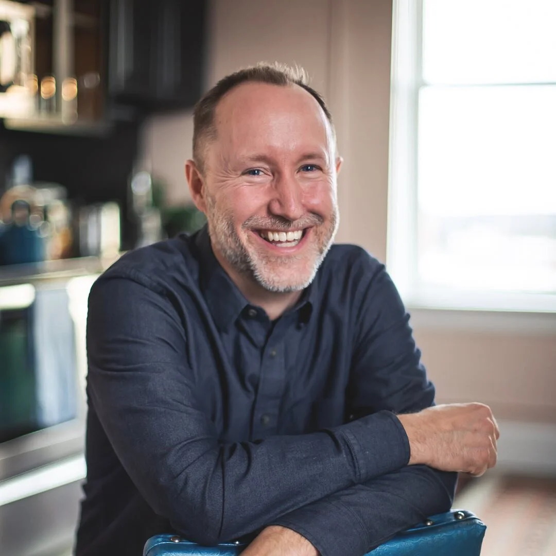 Nathan is brimming with gusto and grit. He believes hope is abundantly more powerful than fear, and wants to tell stories that inspire people to do great things. He is our Founder &amp; CEO. &bull;
Fun fact: Nathan sold beer to Michael J. Fox and Spi