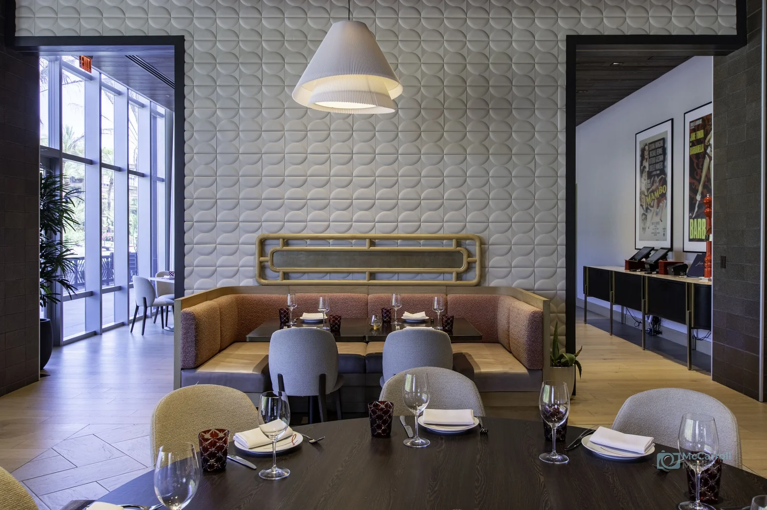 Restaurant booth gives the sequence a closer, more intimate scale.