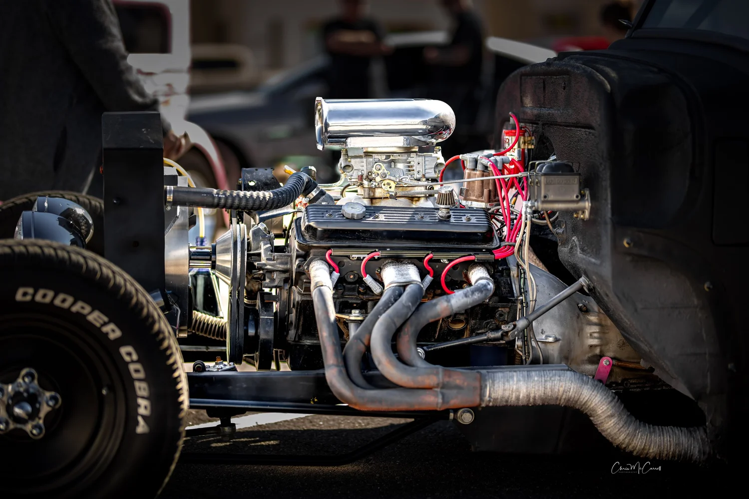 Exposed engine detail: mechanical craftsmanship and dramatic tonal contrast.