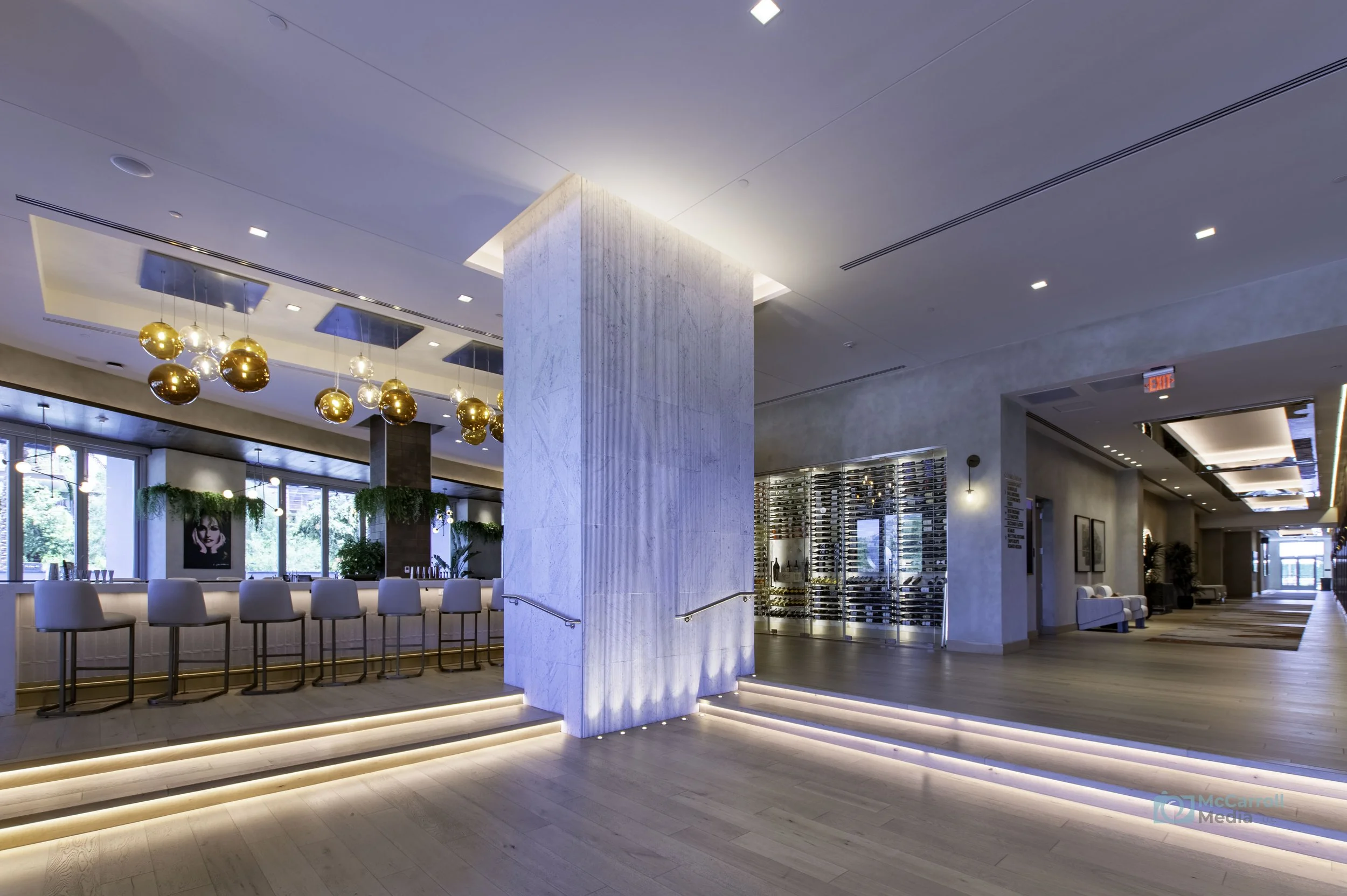 Illuminated stone and lobby architecture at Caesars Republic