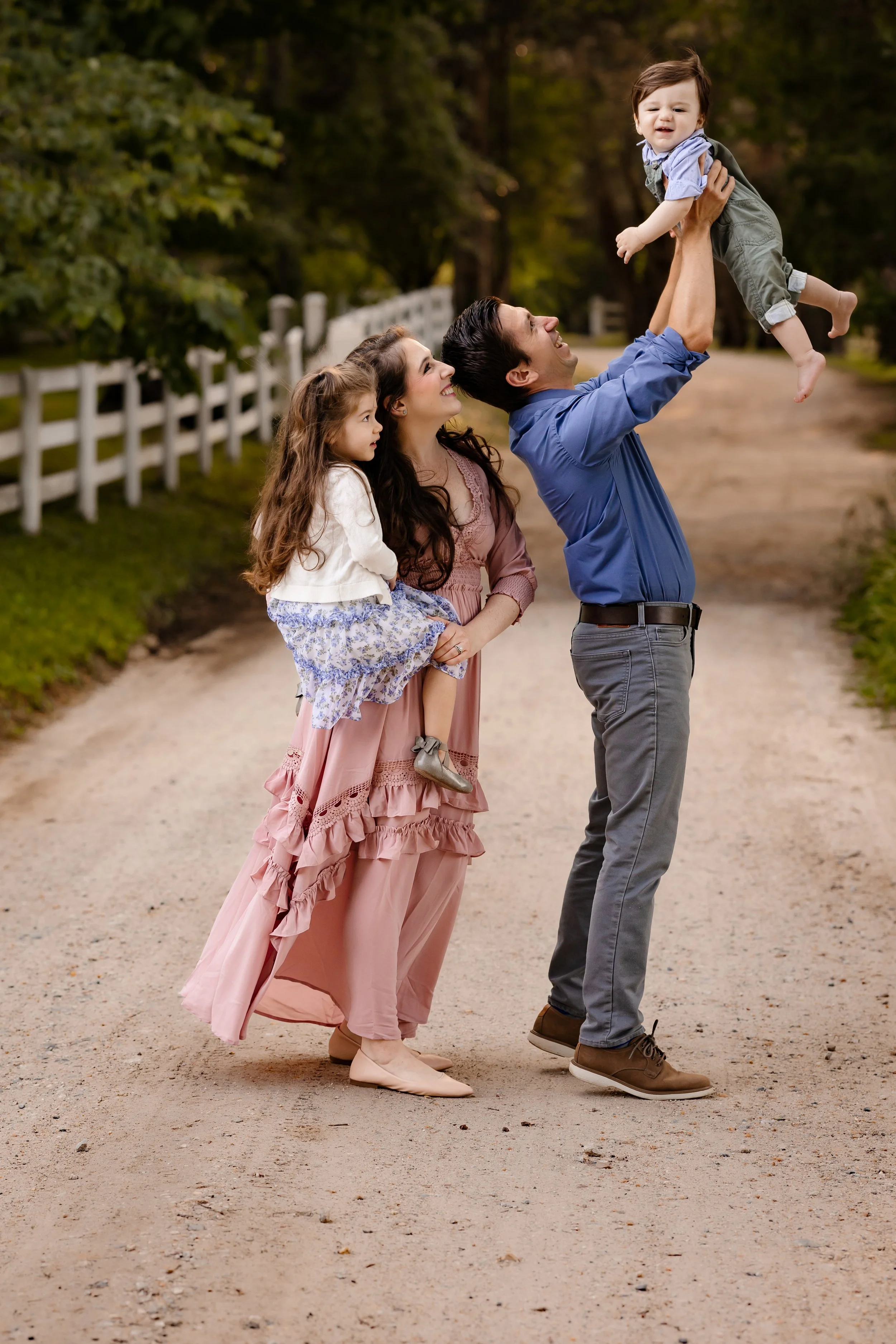 candid family portrait with soft sunlight and neutral tones 
