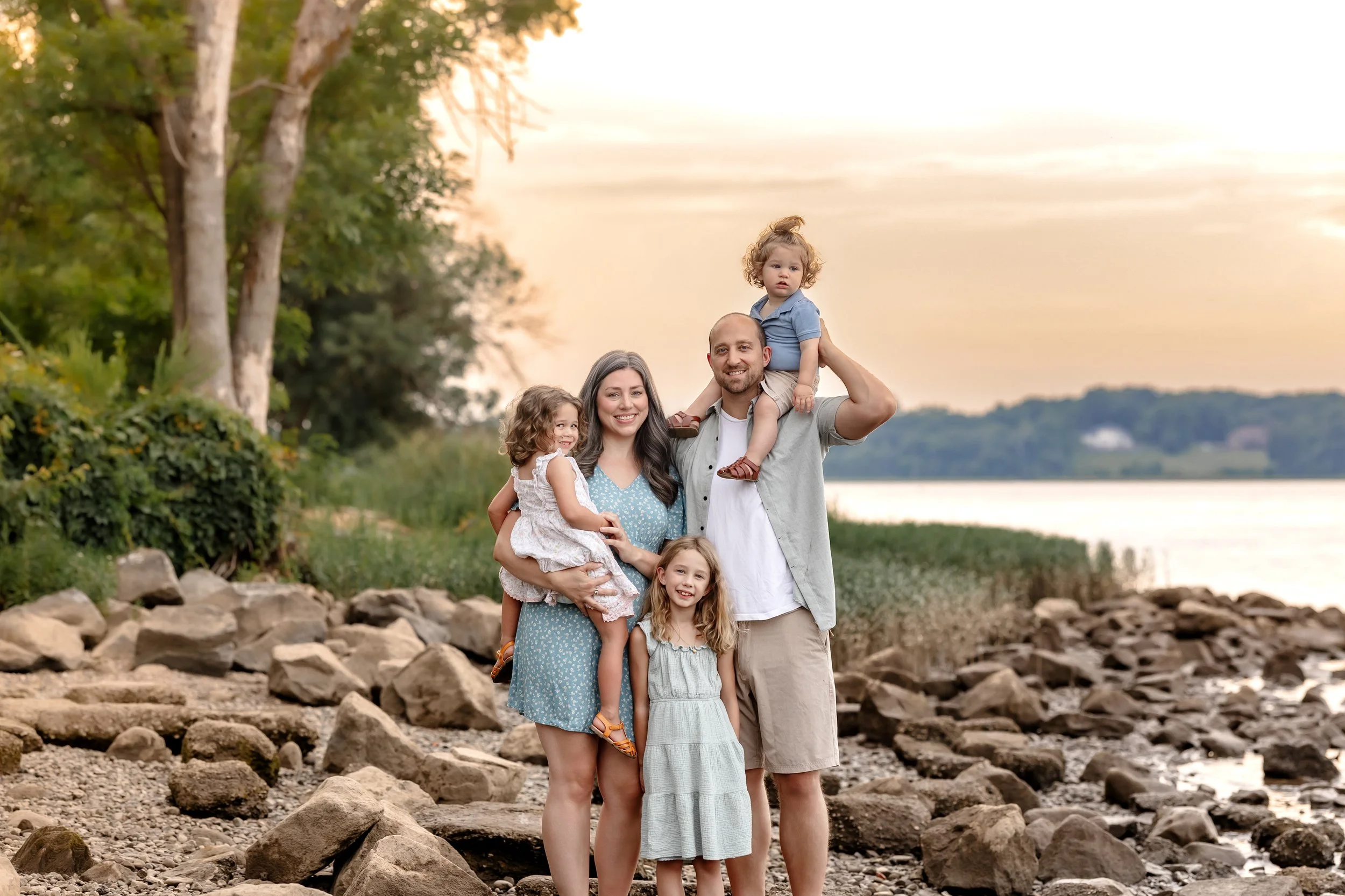 Family of five during a sunset family photography session along the James River in Richmond, Virginia.