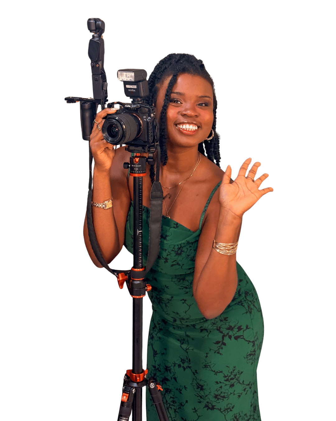 Faye Constant setting up a camera on a tripod before a session
