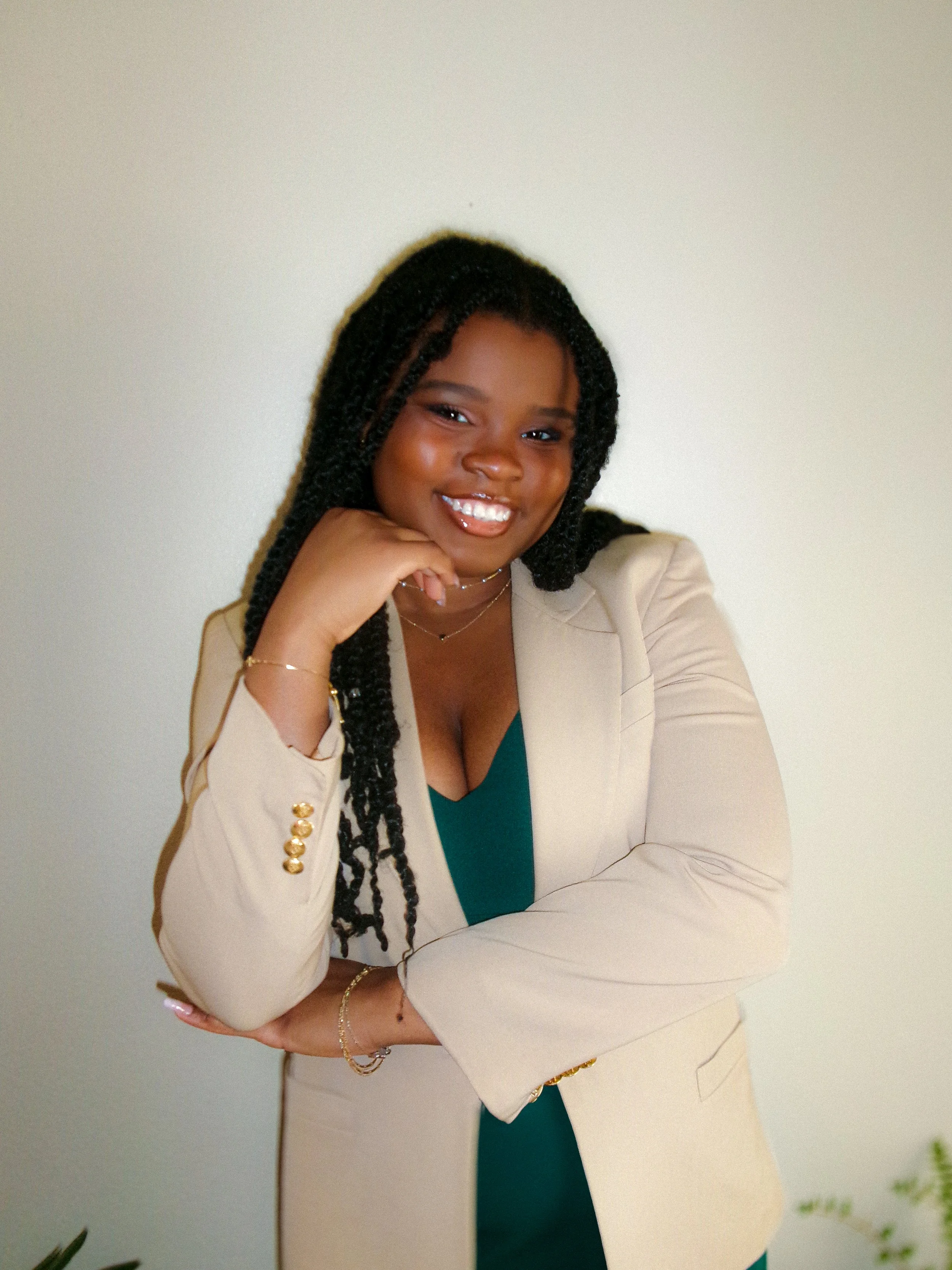 Faye Constant smiling, inviting questions for YouTube Q&A