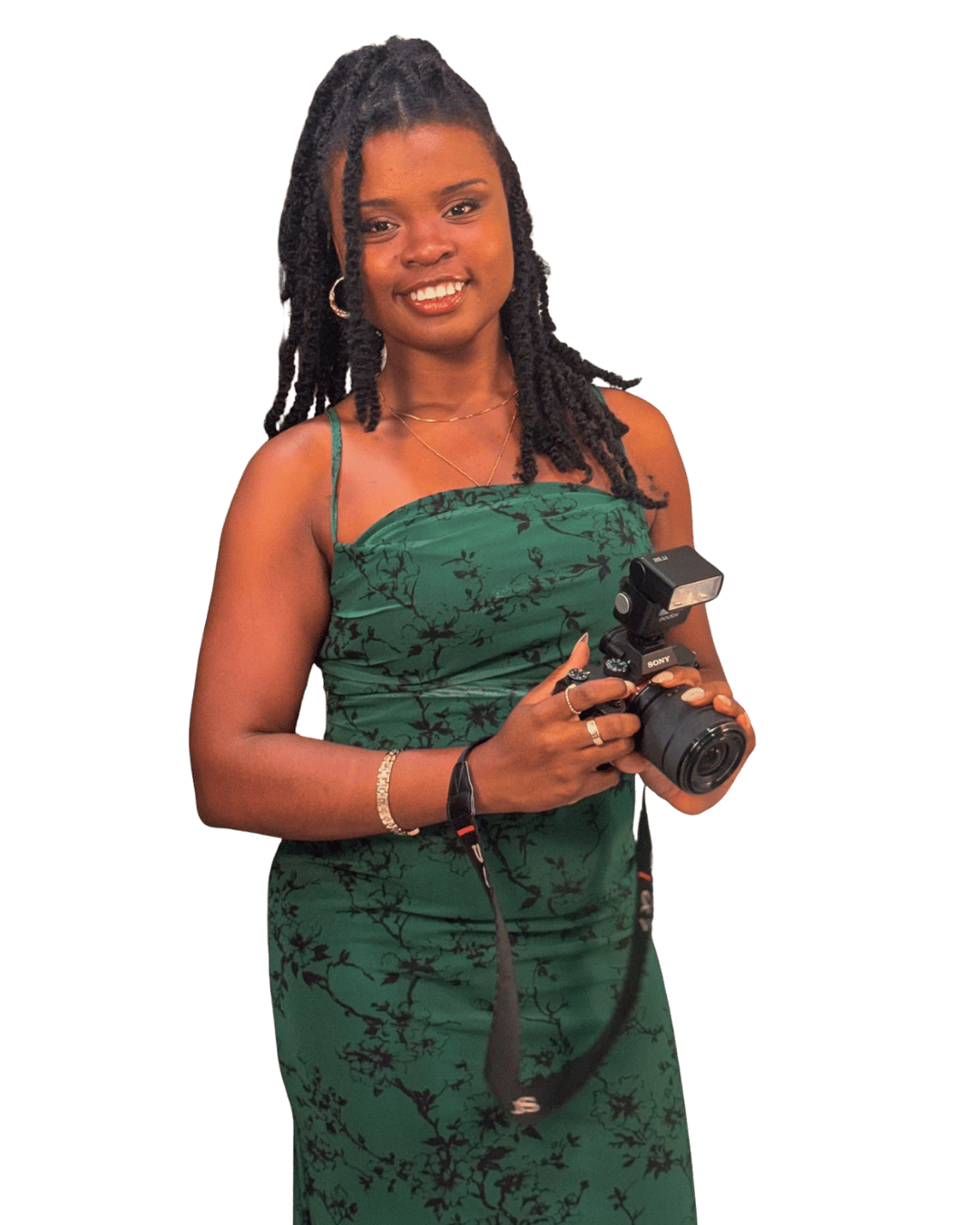 Faye Constant with a camera, ready to photograph a small business on location