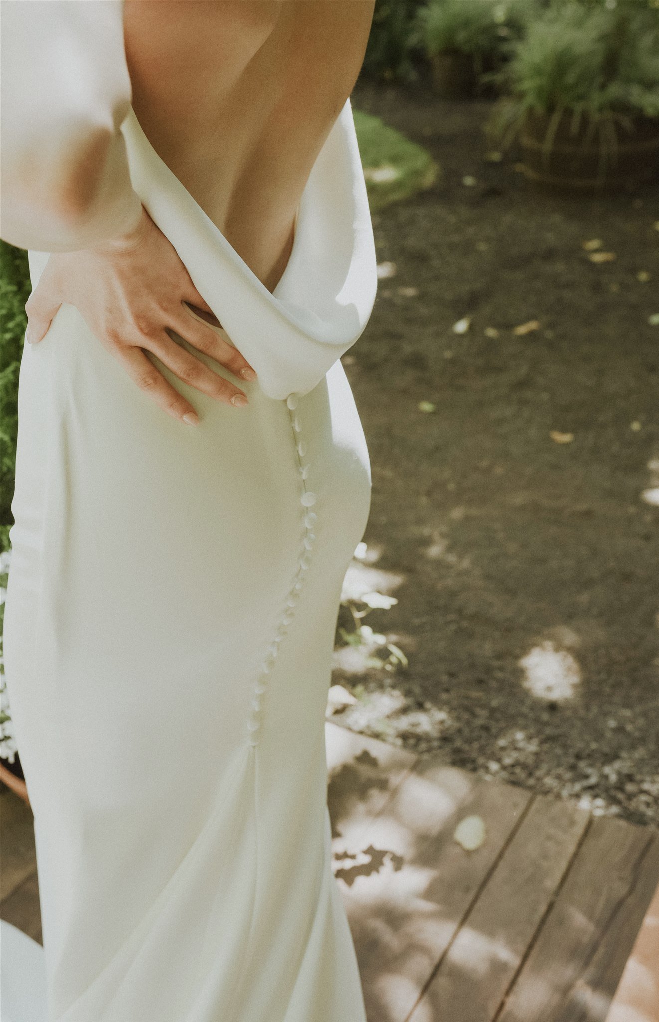 Low back wedding dress with buttons