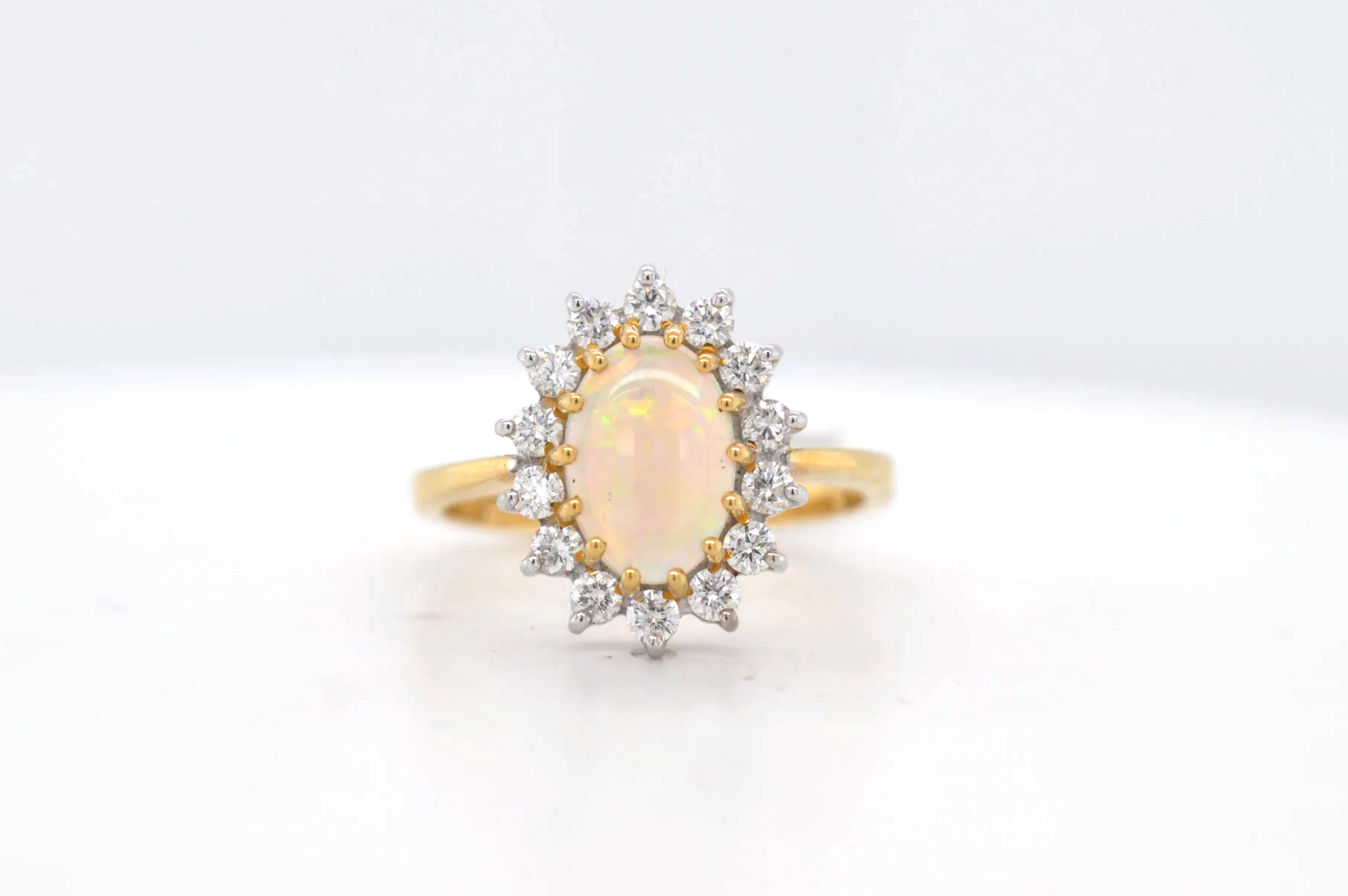 18ct Opal & Diamond Price Band H (£2,500 - £3,000) 21526