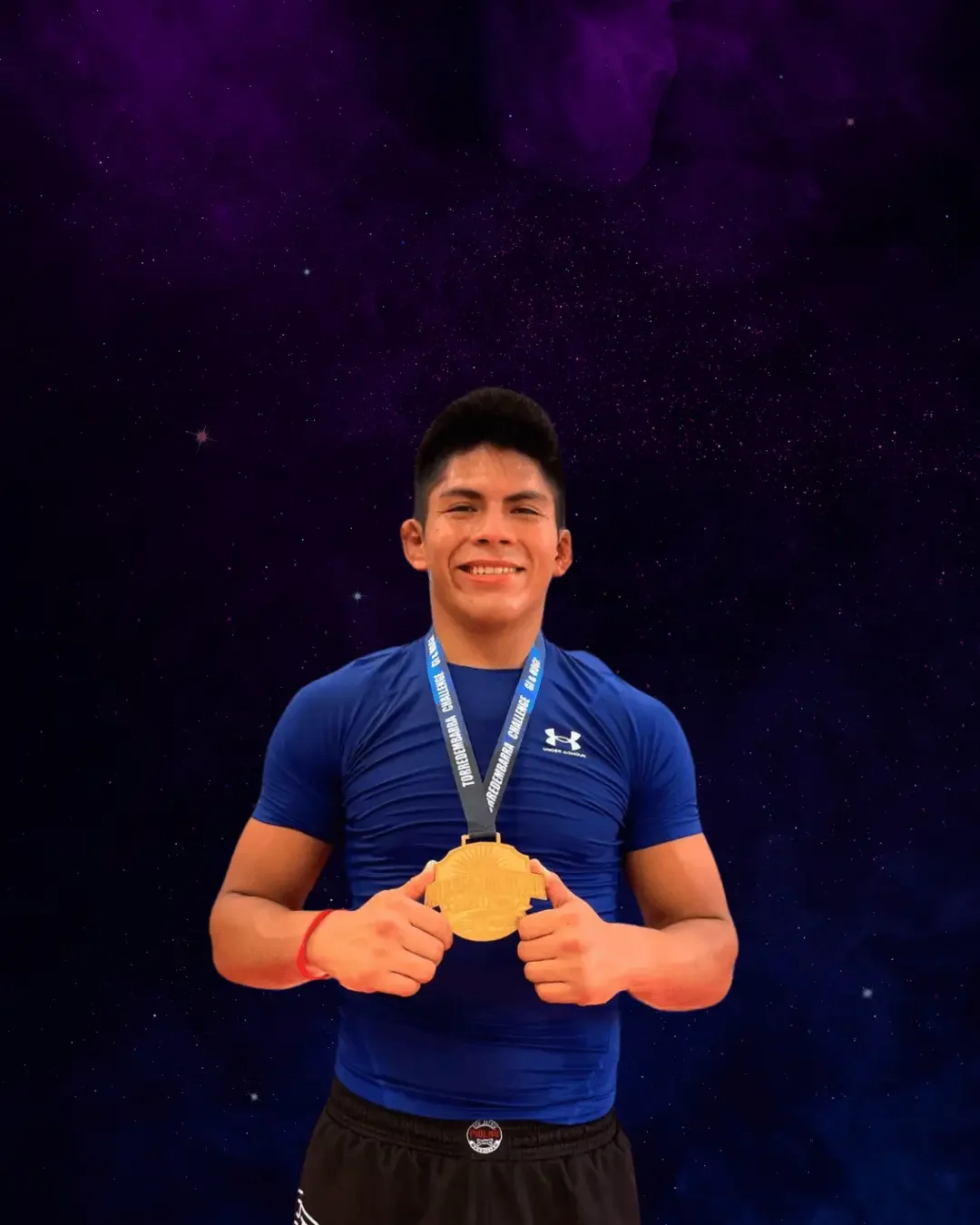 A young male athlete in a blue shirt holding a gold medal, smiling, with a starry space background.