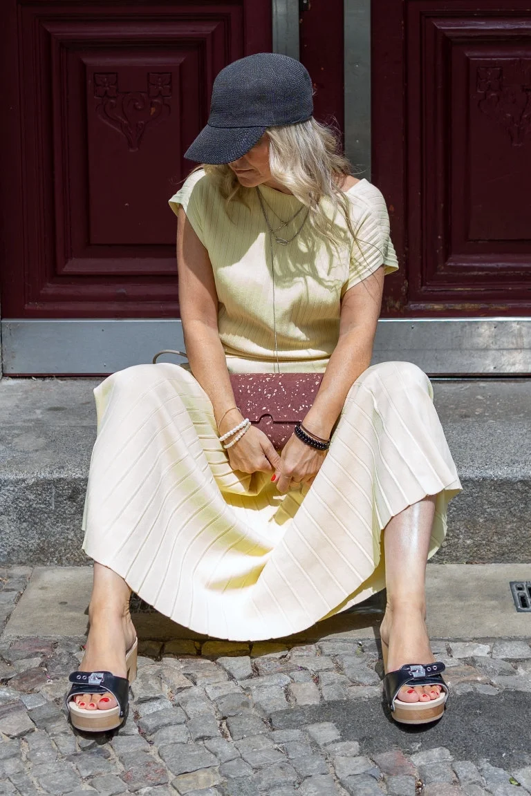 Tasche als Clutch getragen