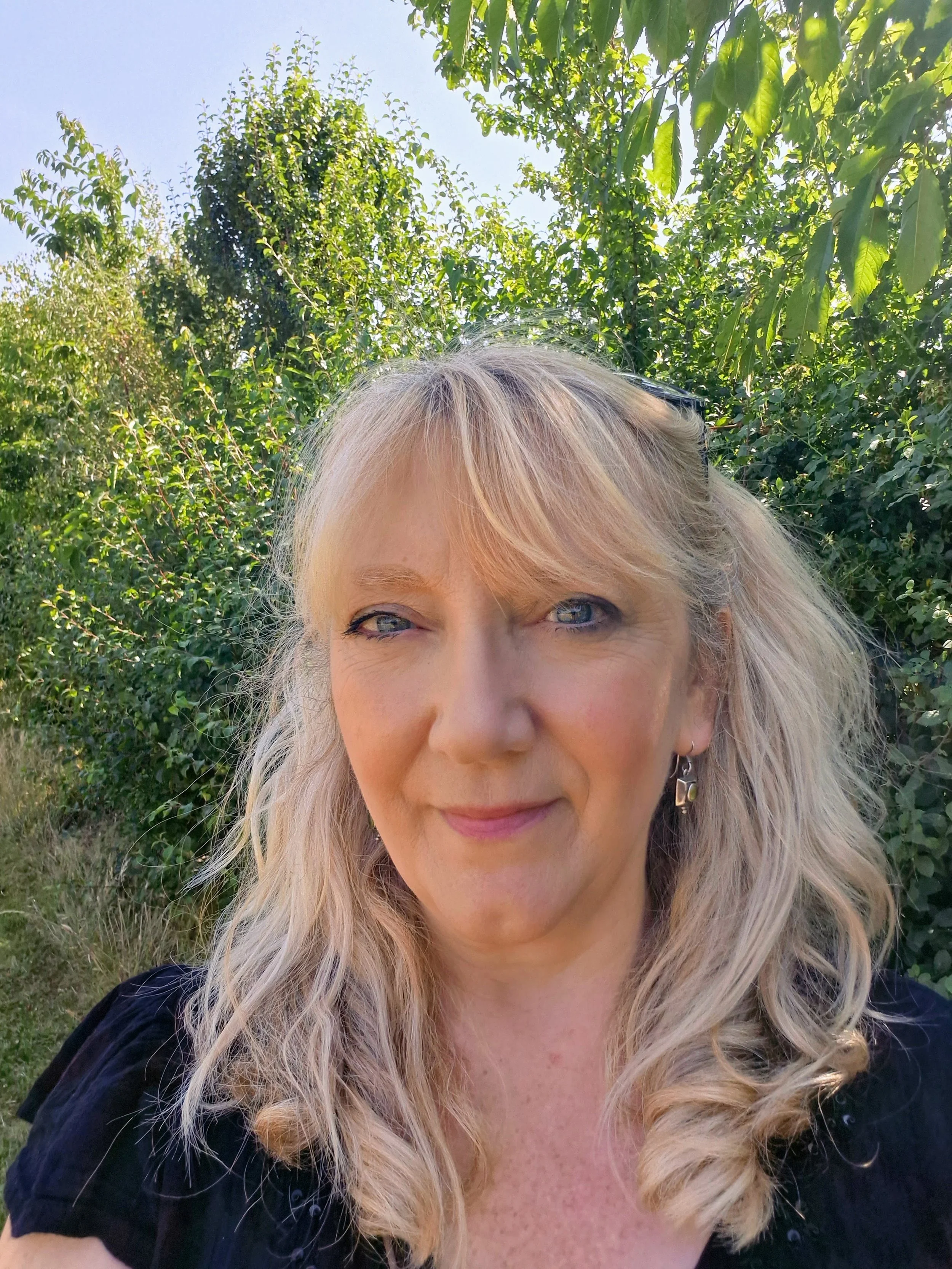 blonde haired woman smiling