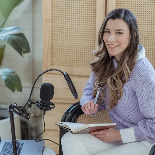 woman microphone laptop