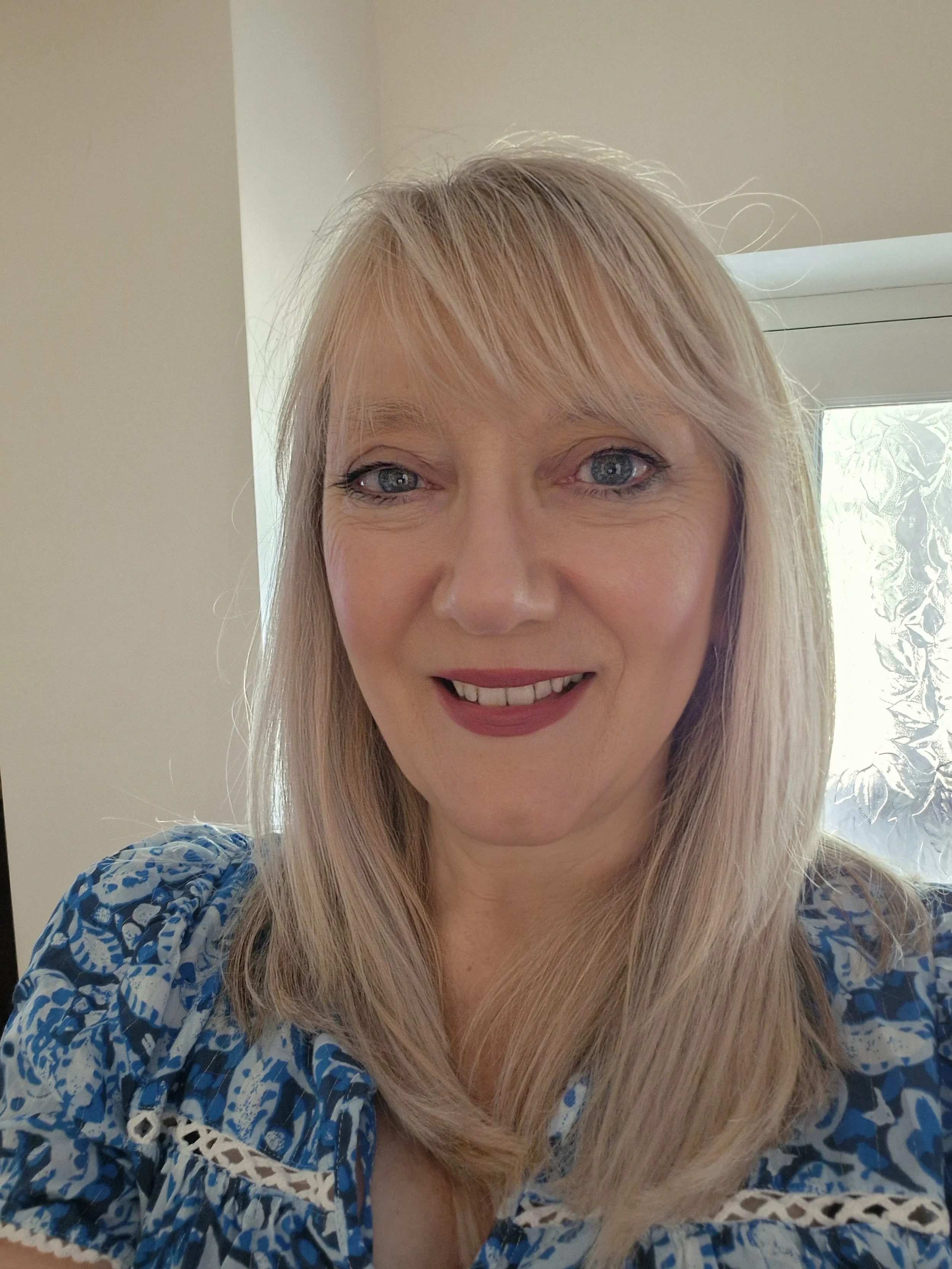 blonde woman smiling