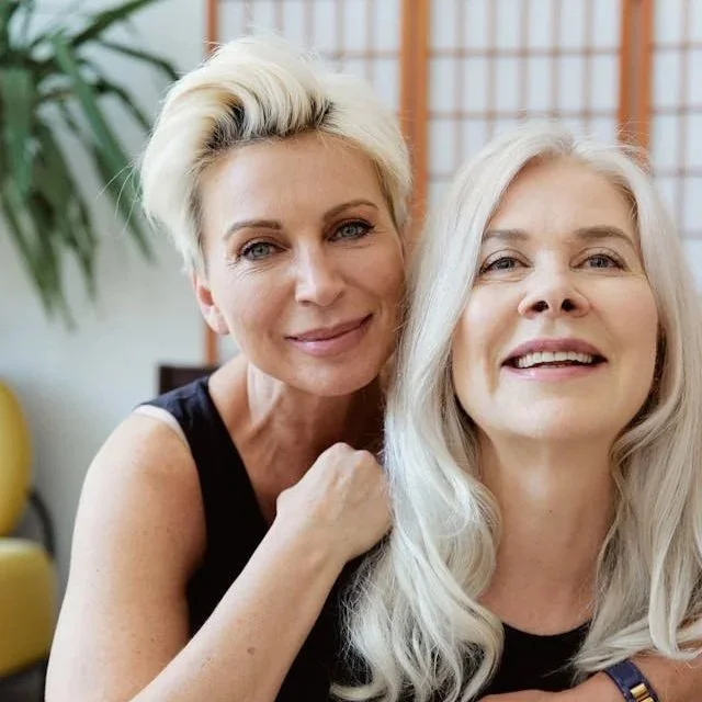 two women smiling