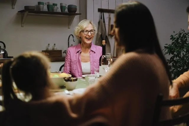 woman with family laughing