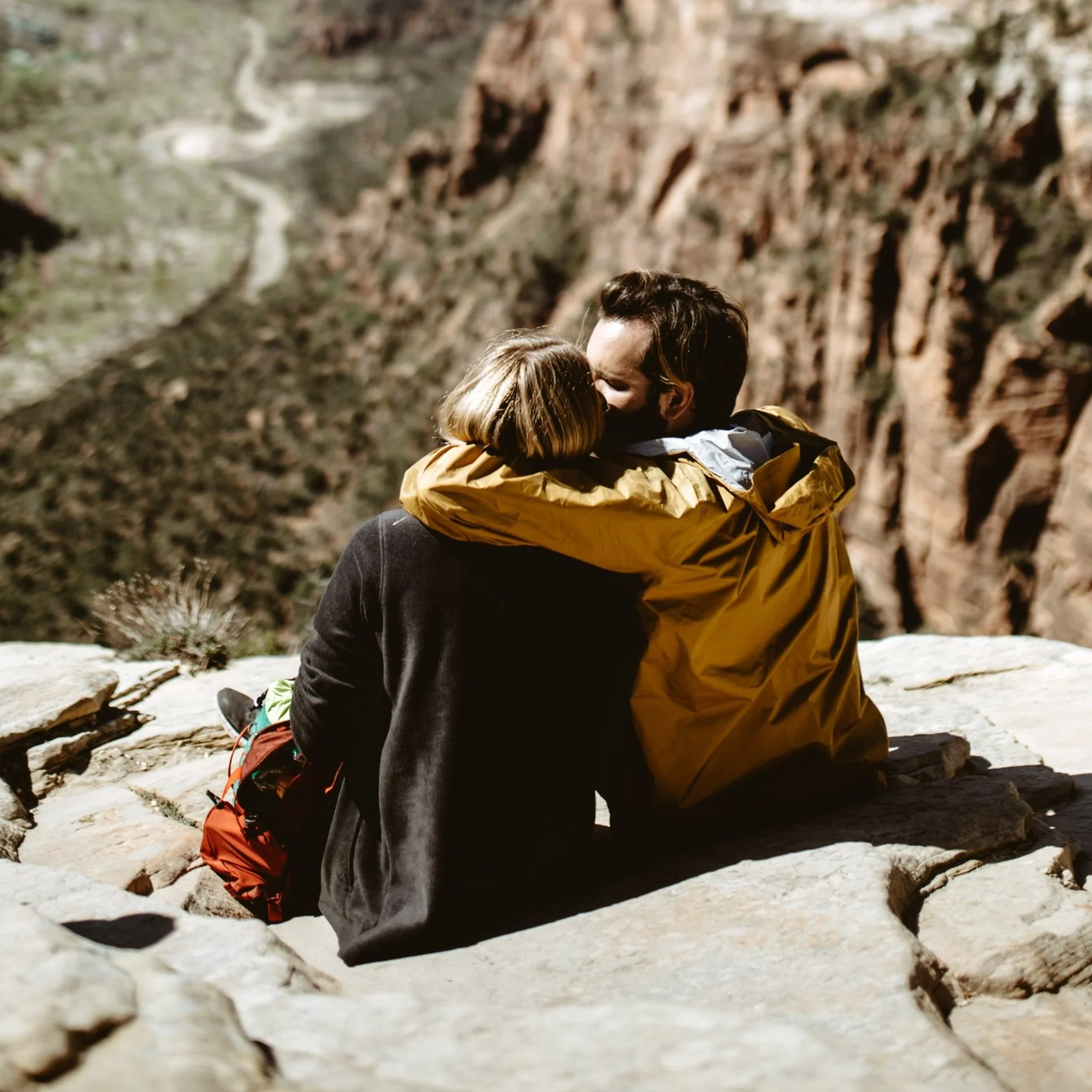 couple sitting on rocks