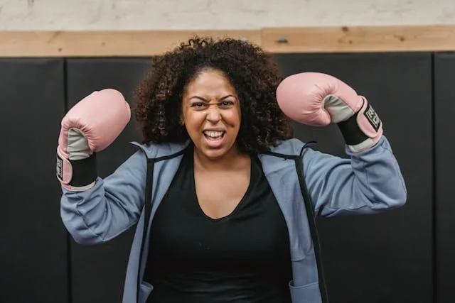 woman boxing gloves determined
