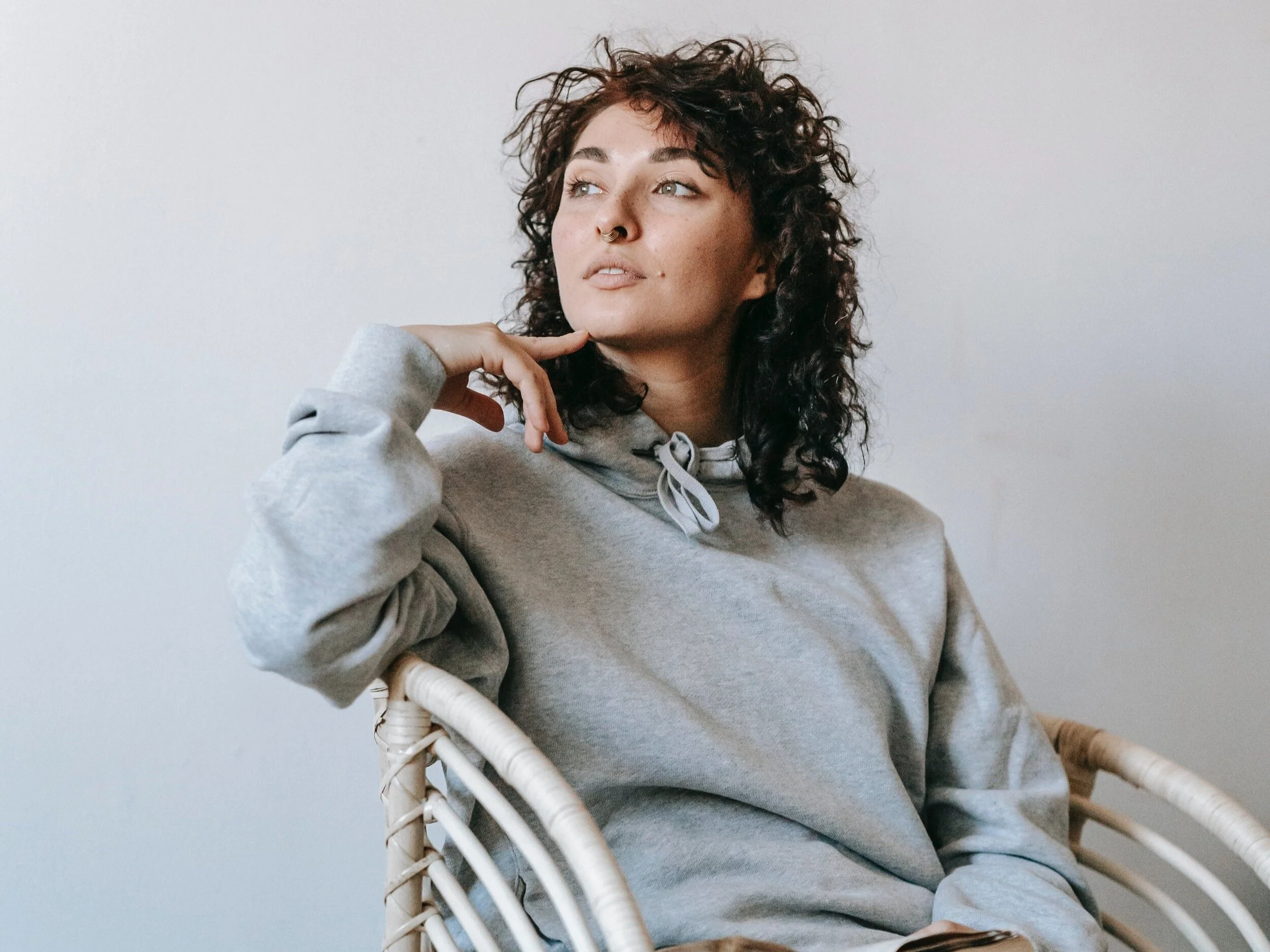 woman holding blister pack of vitamins