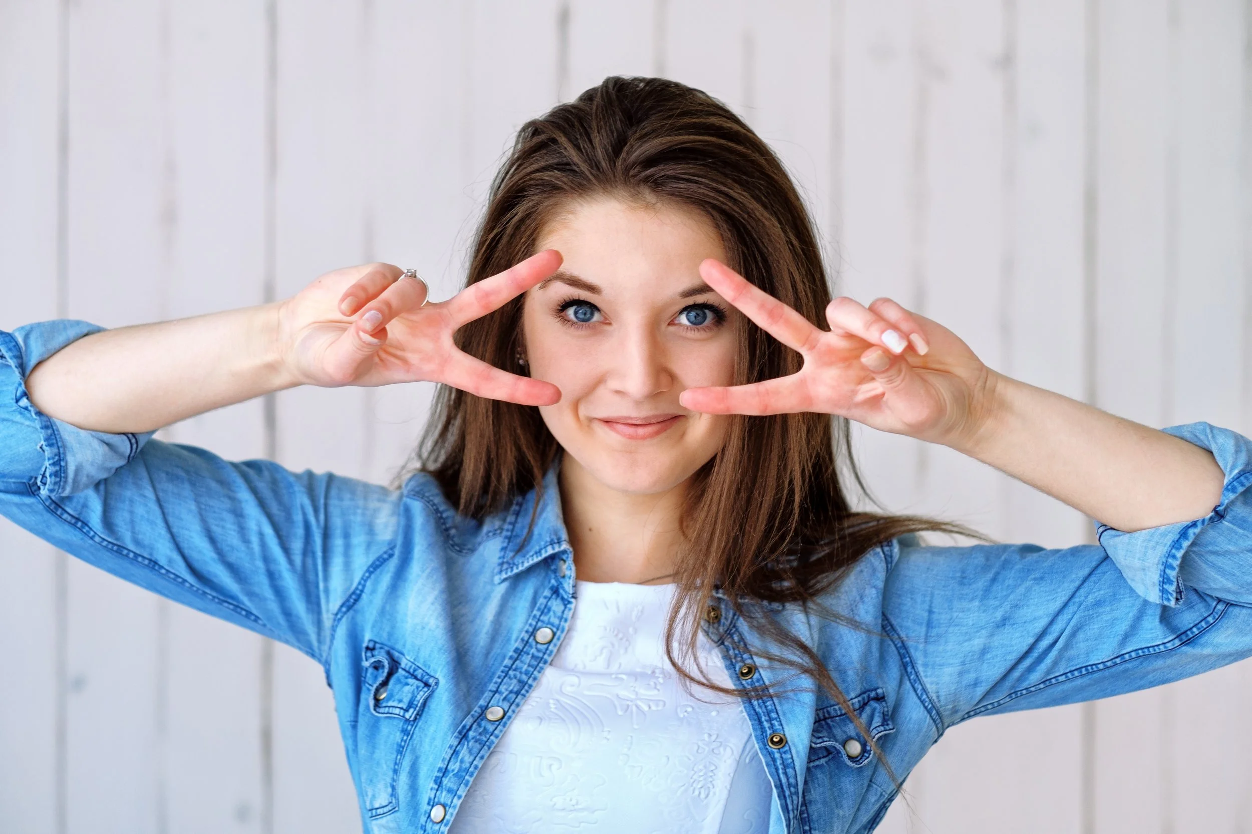 woman smiling blue shirt