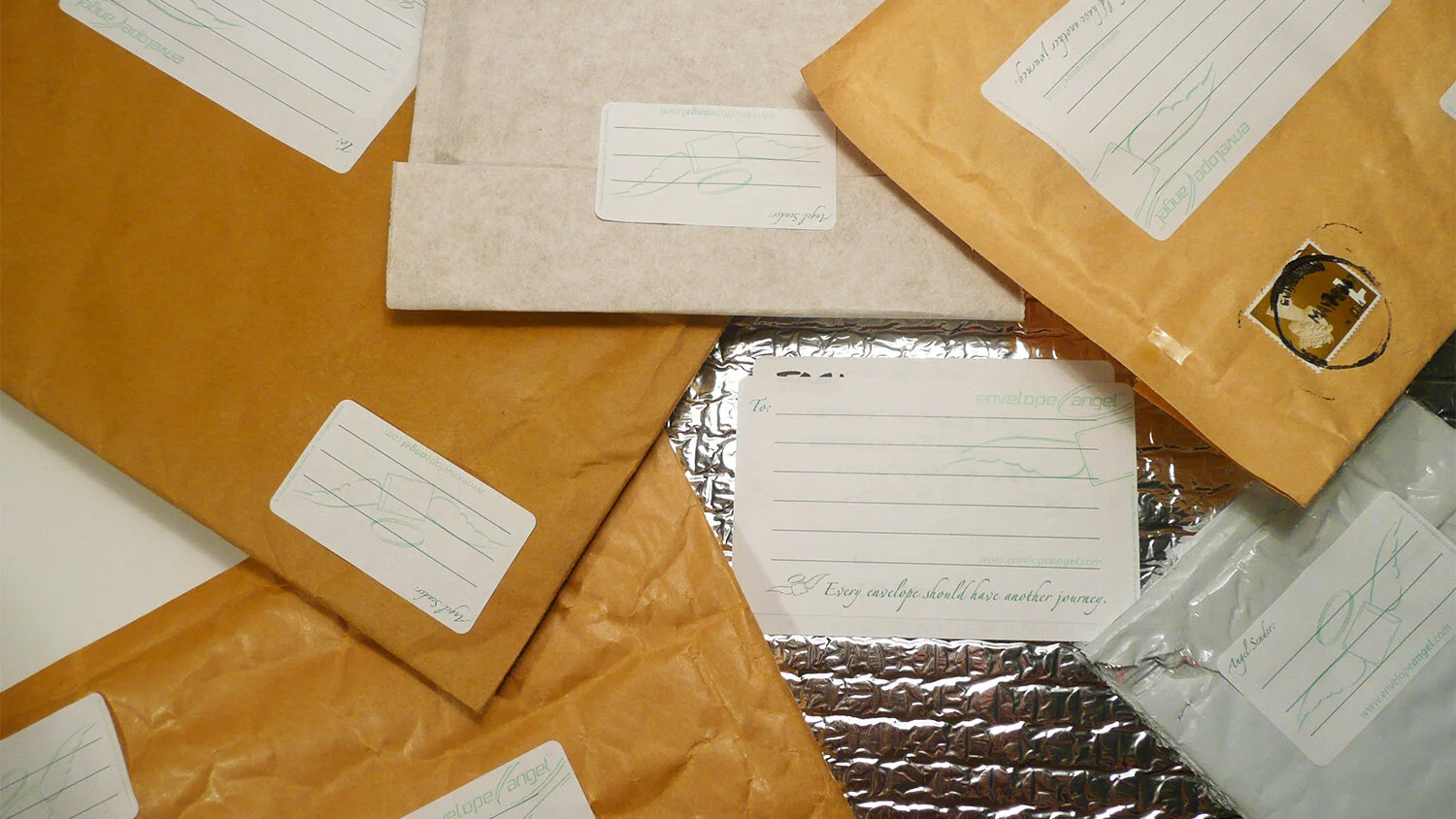 Blue-Marmalade-Envelope-Angel-re-use-envelopes-label-recyclable-biodegradable-packaging-in-use.jpg