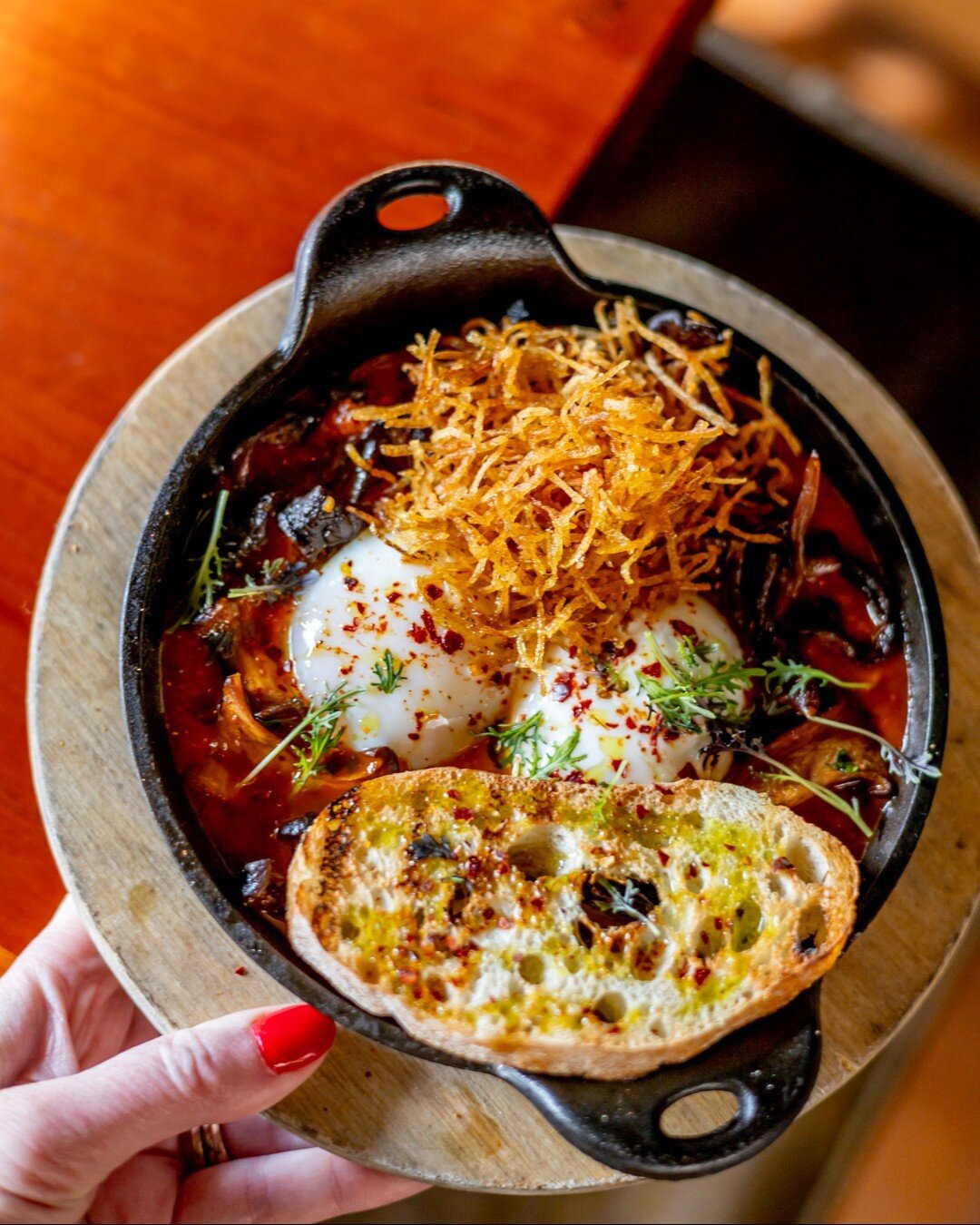 On Weekends, We Brunch! Join us every Saturday and Sunday for a Pan-Mediterranean Brunch Experience. Here's a look at our Shakshouka made with 
63&ordm; eggs, Turkish Tomato Sauce, Peppers, and Pickled Chilies, and served with a choice of Soujouk Sau