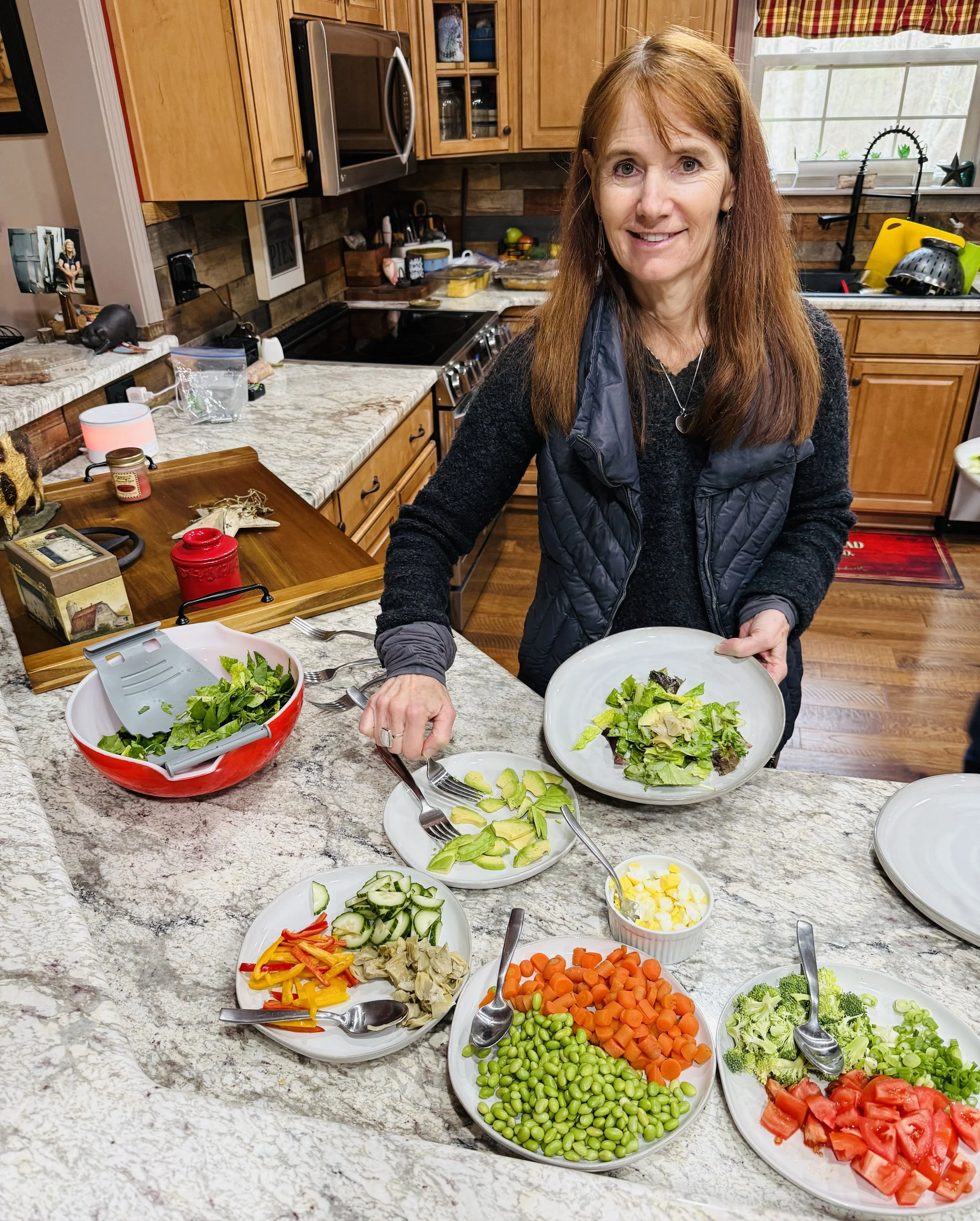 Coach Gayle prepares a buffet of health whole foods in her sister's kitchen.