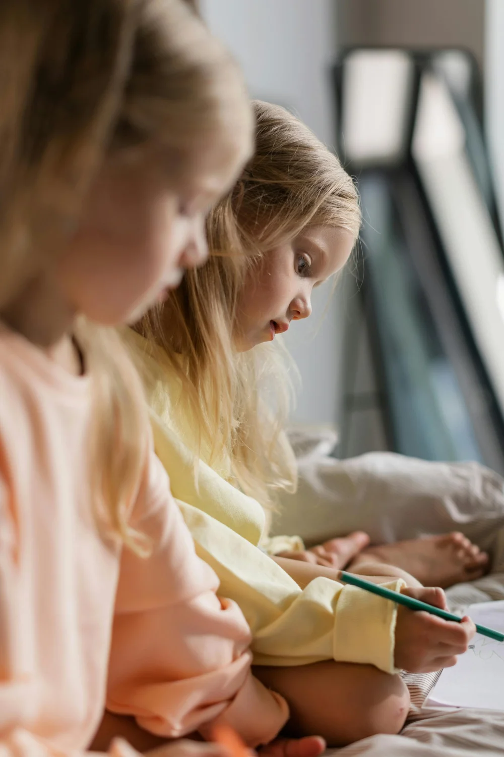 Parent and child working together at a table