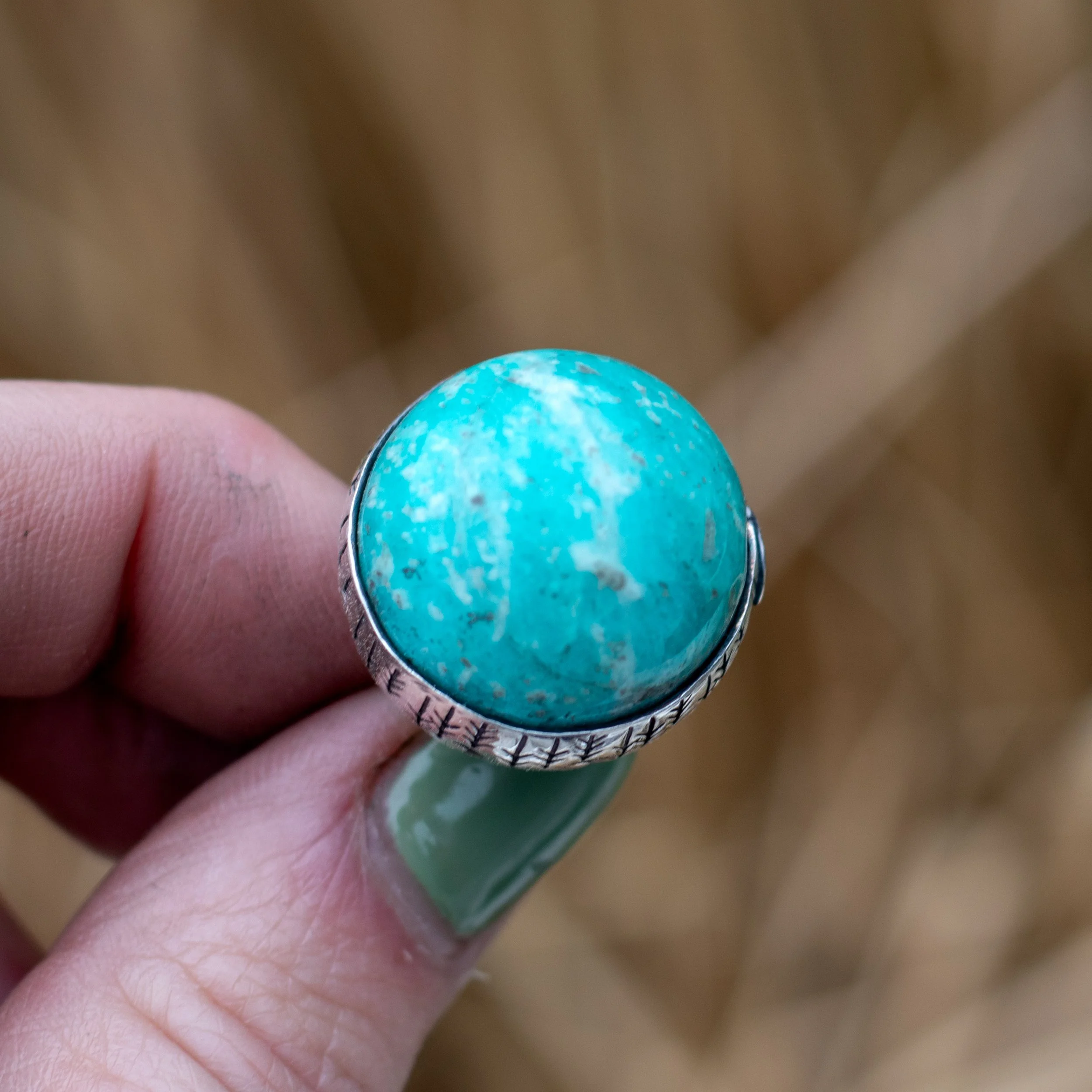 crystal ball focused on an amazonite sphere